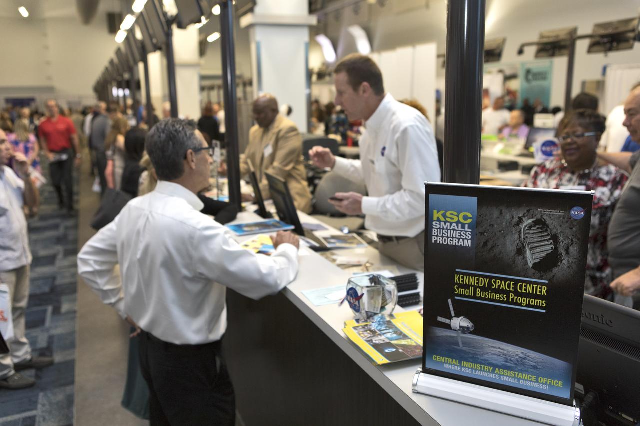 Attendees talk to representatives from Kennedy Space Center's Central Industry Assistance Office, during the agency's Business Opportunities Expo 2018, on Oct. 23, inside Cruise Terminal 6 at Port Canaveral in Florida. The 28th Business Opportunities Expo featured more than 200 businesses, large and small, and government exhibitors from throughout the Space Coast and the nation. The Business Opportunities Expo is facilitated by Kennedy's Small Business Programs Office and Prime Contractor Board, along with the U.S. Air Force 45th Space Wing and Canaveral Port Authority. Vendors from a variety of product and service areas, such as computer technology, engineering services, communication equipment and services, and construction and safety products, to name a few, were at the expo. Representatives from the 45th Space Wing, Kennedy prime contractors, NASA and many more agencies and organizations were on hand to provide information and answer questions.
