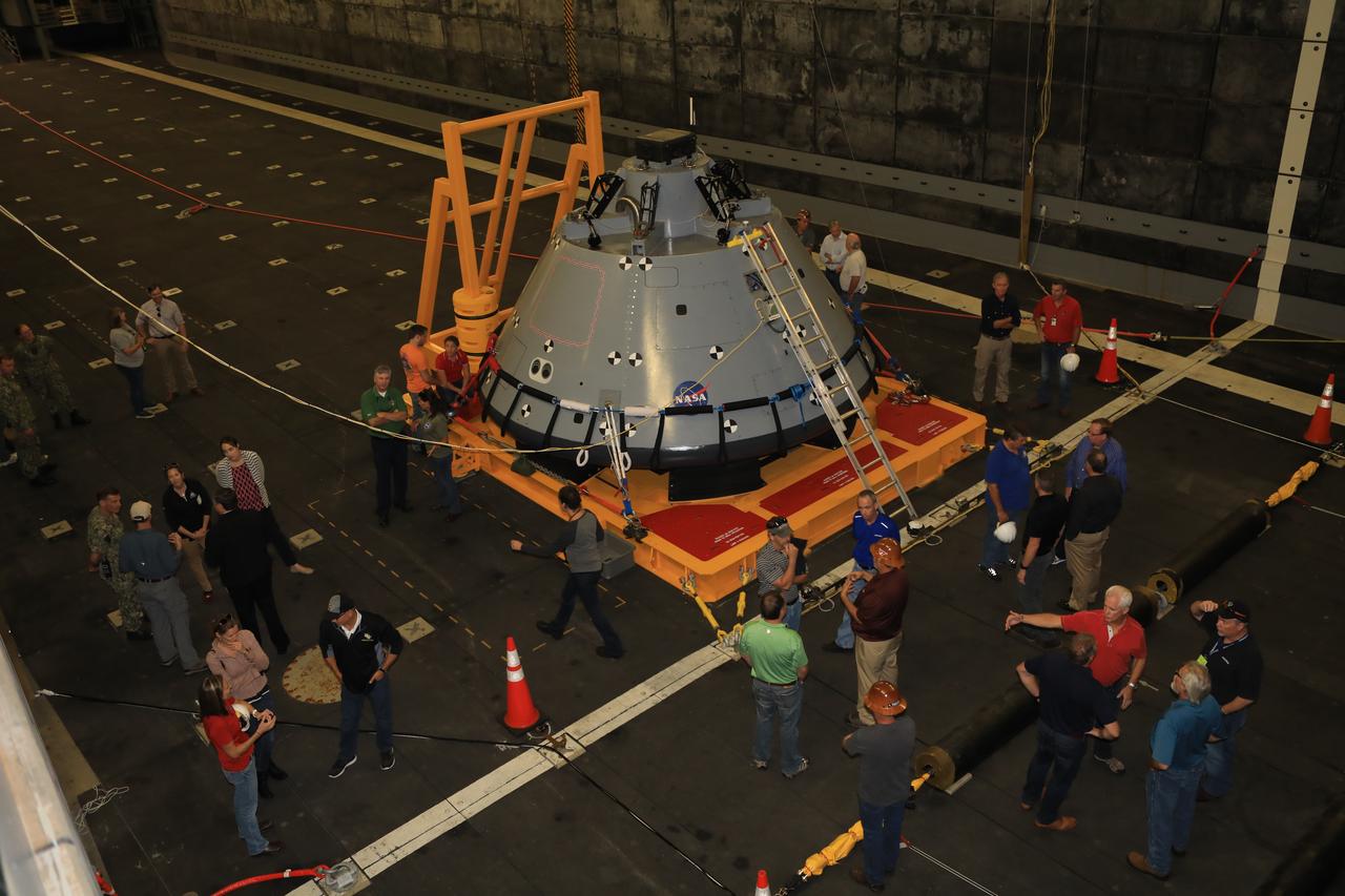 Senior leaders from around NASA receive a familiarization tour by the Exploration Ground Systems (EGS) recovery team on Oct. 29, 2018, as they prepare for Underway Recovery Test-7 (URT-7) aboard a U.S. Navy ship. EGS and the U.S. Navy will use a test version of the Orion crew module, several rigid hull inflatable boats and support equipment to verify and validate processes, procedures, hardware and personnel during recovery of Orion in open waters. URTs are a series of tests to ensure all systems are go when recovering the Orion crew capsule and astronauts onboard in the future. Orion will have emergency abort capability, sustain the crew during space travel and provide safe re-entry from deep space return velocities.