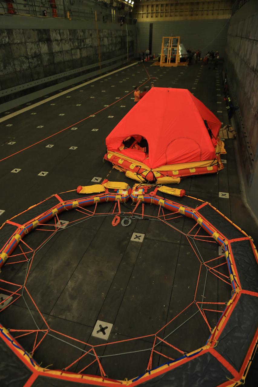 A stabilization collar and front porch are in the well deck of a U.S. Navy ship on Oct. 29, 2018. They will be used to stabilize and recover the Orion capsule and future crew onboard. The Exploration Ground Systems (EGS) recovery team are preparing for Underway Recovery Test-7 (URT-7). EGS and the U.S. Navy will use a test version of the Orion crew module, several rigid hull inflatable boats and support equipment to verify and validate processes, procedures, hardware and personnel during recovery of Orion in open waters. URTs are a series of tests to ensure all systems are go when recovering the Orion crew capsule and astronauts onboard in the future. Orion will have emergency abort capability, sustain the crew during space travel and provide safe re-entry from deep space return velocities.