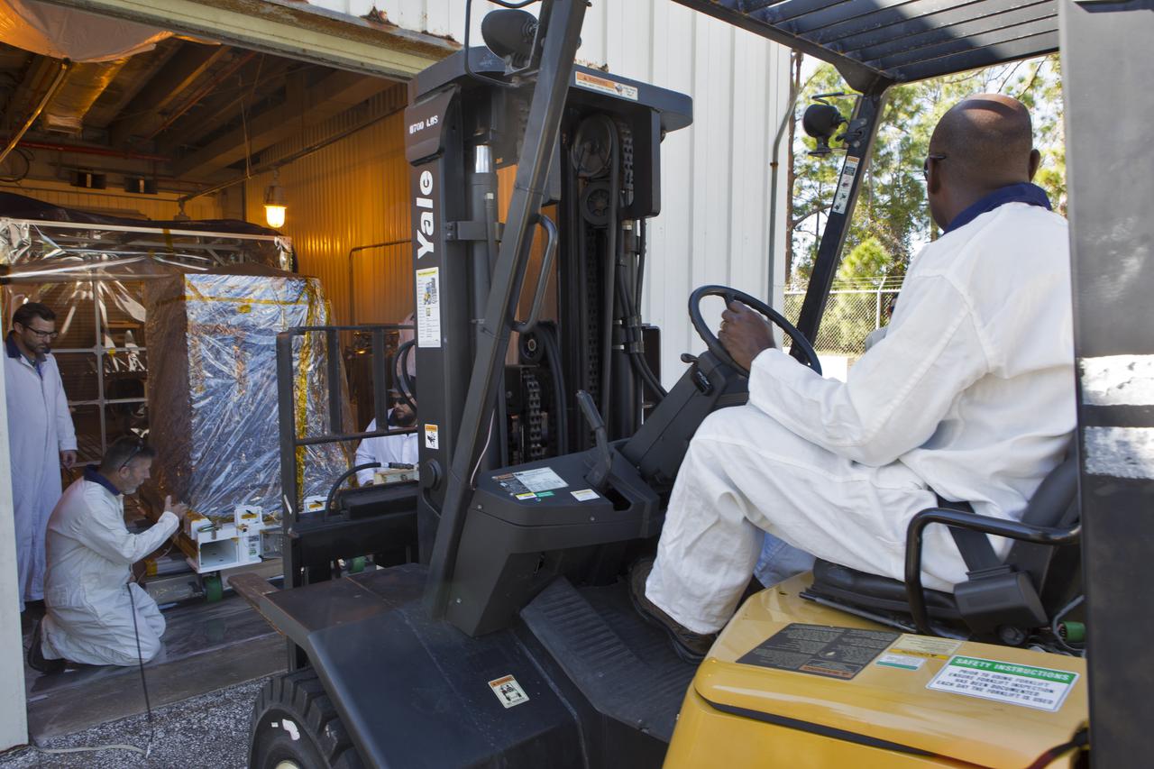 A forklift is being used to lift the Robotic Refueling Mission-3 (RRM3) payload out of the Fuel Transfer Building on Oct. 30, 2018, to be transported to the SpaceX facility at NASA's Kennedy Space Center in Florida. The payload will be carried to the International Space Station on SpaceX's 16th Commercial Resupply Services mission. RRM3 demonstrates the transfer of xenon gas and liquid methane in microgravity, and advances technologies for storing and manipulating these cryogenic fuels robotically. RRM3 also supports development of technology for the Restore-L mission, a robotic spacecraft equipped to service satellites in-orbit.