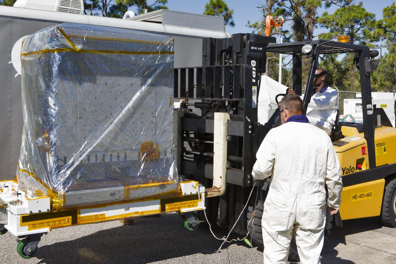 Workers prepare the Robotic Refueling Mission-3 (RRM3) payload for transport from the Fuel Transfer Building to the SpaceX facility on Oct. 30, 2018, at NASA's Kennedy Space Center in Florida. The payload will be carried to the International Space Station on SpaceX's 16th Commercial Resupply Services mission. RRM3 demonstrates the transfer of xenon gas and liquid methane in microgravity, and advances technologies for storing and manipulating these cryogenic fuels robotically. RRM3 also supports development of technology for the Restore-L mission, a robotic spacecraft equipped to service satellites in-orbit.