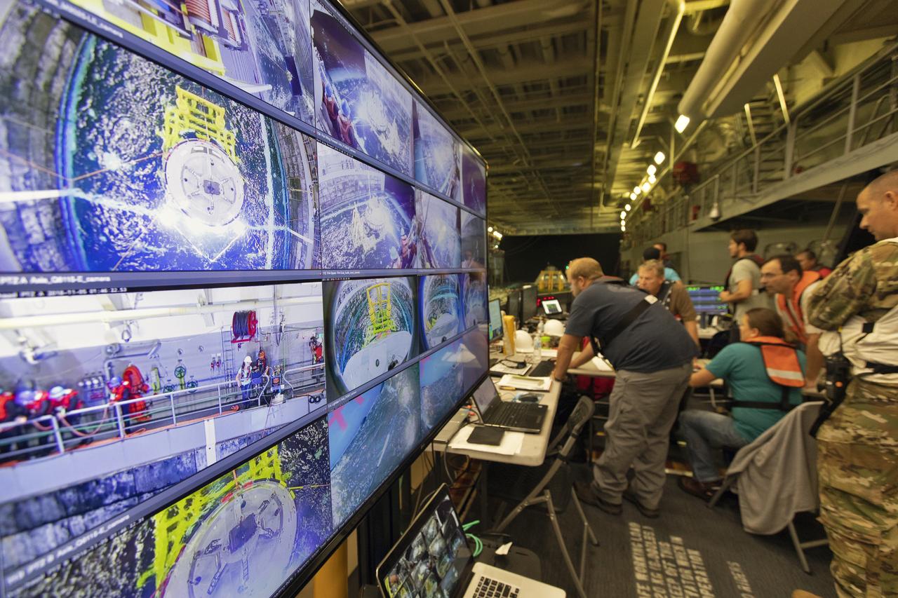 NASA Recovery Team members and wave trackers monitor recovery of a test version of the Orion crew module inside the USS John P. Murtha, during Underway Recovery Test (URT-7) on Nov. 4 2018. URT-7 is one in a series of tests conducted by the Exploration Ground Systems Recovery Team to verify and validate procedures and hardware that will be used to recover the Orion spacecraft after it splashes down in the Pacific Ocean following deep space exploration missions. Orion will have emergency abort capability, sustain the crew during space travel and provide safe re-entry from deep space return velocities.
