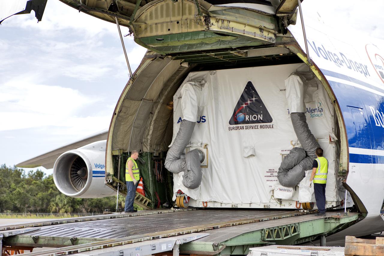 The shipping container holding the European Service Module (ESM) is moved out of the cargo hold of the Antonov cargo aircraft at the Shuttle Landing Facility at NASA's Kennedy Space Center in Florida on Nov. 6, 2018. The ESM, built by the European Space Agency, will supply the main propulsion system and power to the Orion spacecraft for Exploration Mission-1 (EM-1), a mission to the Moon. The ESM also will house air and water for astronauts on future missions. EM-1 will be an uncrewed flight test that will provide a foundation for human deep space exploration to destinations beyond Earth orbit. EM-1 will be the first integrated test of NASA's Space Launch System, Orion and the ground systems at Kennedy.