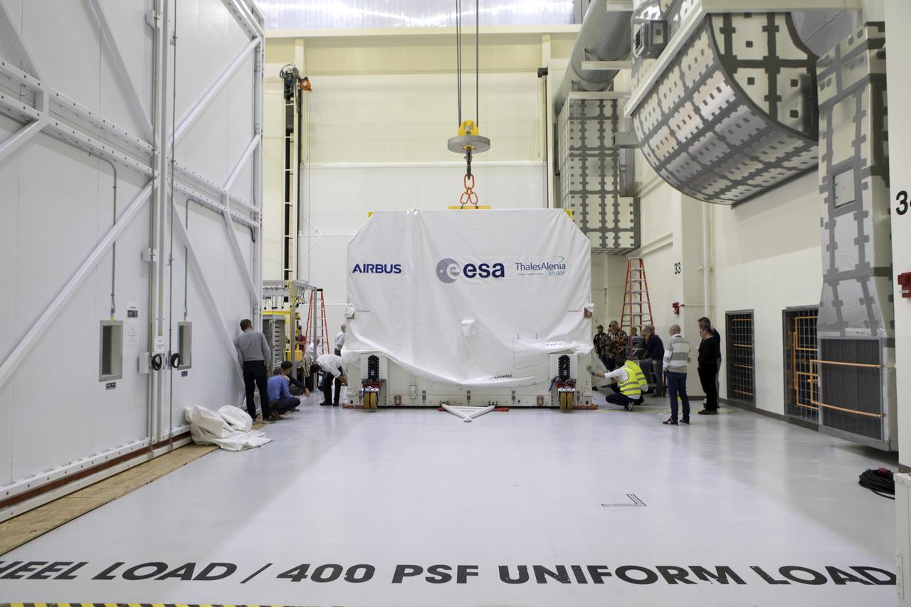 The European Space Agency's European Service Module (ESM), in its shipping container, is inside the airlock at the Neil Armstrong Operations and Checkout Building high bay on Nov. 6, 2018, at NASA's Kennedy Space Center in Florida. The ESM will supply the main propulsion system and power to the Orion spacecraft for Exploration Mission-1 (EM-1), a mission to the Moon. The ESM also will house air and water for astronauts on future missions. EM-1 will be an uncrewed flight test that will provide a foundation for human deep space exploration to destinations beyond Earth orbit. EM-1 will be the first integrated test of NASA's Space Launch System, Orion and the ground systems at Kennedy.