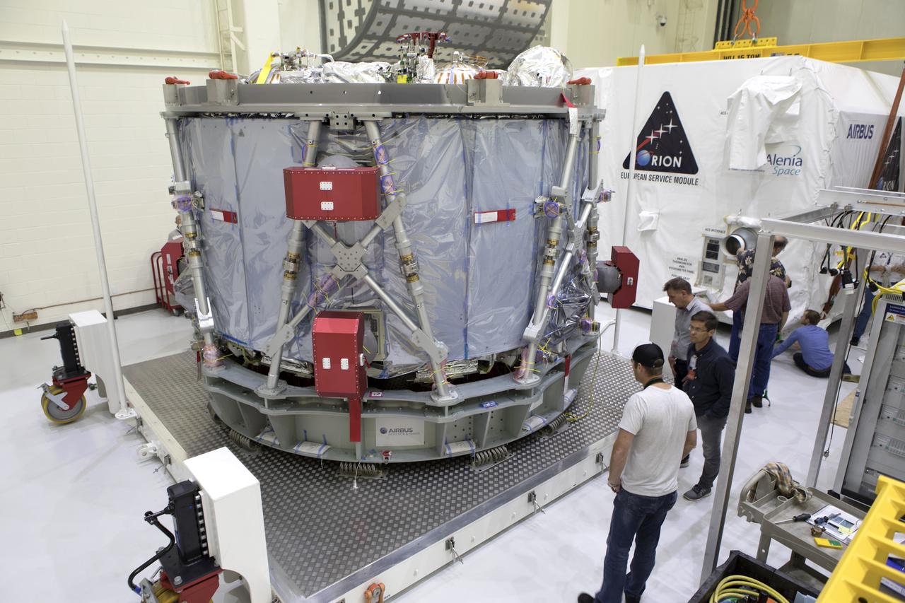 Inside the airlock in the Neil Armstrong Operations and Checkout Building high bay on Nov. 6, 2018, the European Space Agency's European Service Module (ESM) is uncrated at NASA's Kennedy Space Center in Florida. The ESM will supply the main propulsion system and power to the Orion spacecraft for Exploration Mission-1 (EM-1), a mission to the Moon. The ESM also will house air and water for astronauts on future missions. EM-1 will be an uncrewed flight test that will provide a foundation for human deep space exploration to destinations beyond Earth orbit. EM-1 will be the first integrated test of NASA's Space Launch System, Orion and the ground systems at Kennedy.