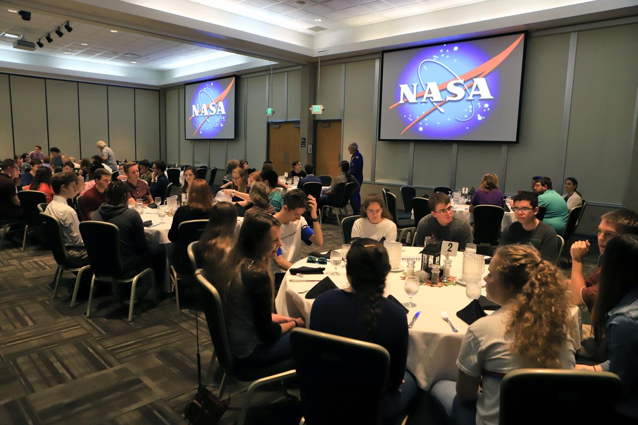 Retired NASA astronaut Bob Springer, standing in front, talks to high school students during "Lunch with an Astronaut" on Nov. 7, 2018, at the NASA Kennedy Space Center Visitor Complex in Florida. Top scholars from Brevard County public high schools were invited to Kennedy Space Center for a tour of facilities, lunch and a roundtable discussion with engineers, scientists and business experts at the center. The 2018 Brevard Top Scholars event was hosted by the center's Academic Engagement Office to honor the top three scholars of the 2018-2019 graduating student class from each of Brevard County’s public high schools. The students received a personalized certificate of recognition at the end of the day.