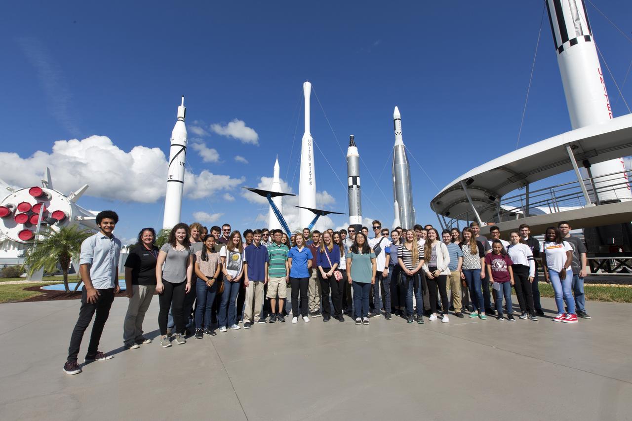 Top scholars from Brevard County high schools gather near the Rocket Garden at the NASA Kennedy Space Center Visitor Complex in Florida, on Nov. 7, 2018. The high school seniors were invited to Kennedy Space Center for a tour of facilities, lunch and a roundtable discussion with engineers, scientists and business experts at the center. The 2018 Brevard Top Scholars event was hosted by the center's Academic Engagement Office to honor the top three scholars of the 2018-2019 graduating student class from each of Brevard County’s public high schools. The students received a personalized certificate of recognition at the end of the day.