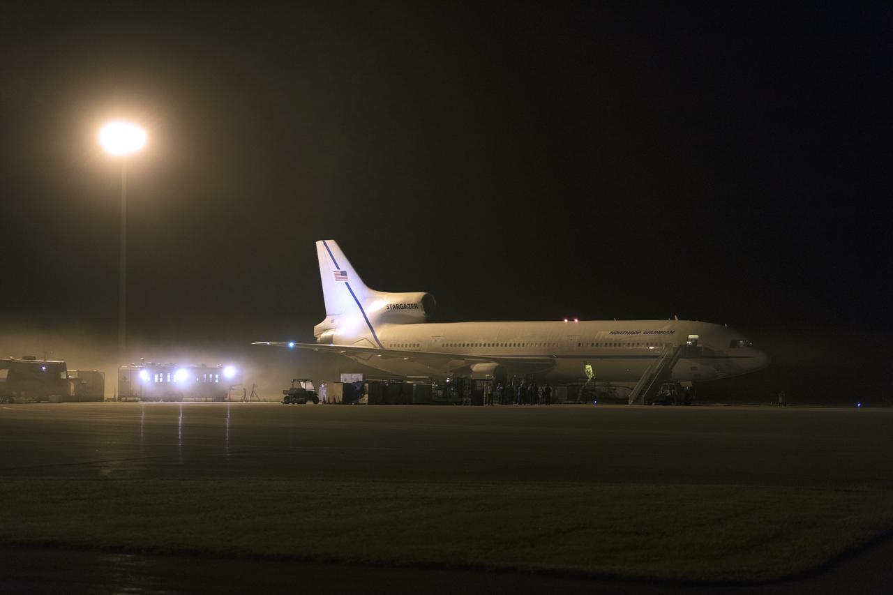 The Northrop Grumman L-1011 Stargazer aircraft, with the Pegasus XL rocket attached beneath, is being prepared for takeoff from the runway at the Skid Strip at Cape Canaveral Air Force Station in Florida on Nov. 7, 2018. NASA's Ionospheric Connection Explorer (ICON) satellite is secured inside the rocket's payload fairing. The Pegasus XL rocket will be carried aloft by the Stargazer. ICON will study the frontier of space - the dynamic zone high in Earth's atmosphere where terrestrial weather from below meets space weather above. The explorer will help determine the physics of Earth's space environment and pave the way for mitigating its effects on our technology, communications systems and society.