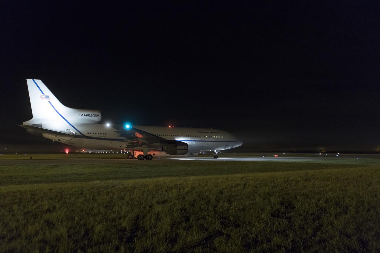 The Northrop Grumman L-1011 Stargazer aircraft, with the Pegasus XL rocket attached beneath, starts down the runway at the Skid Strip at Cape Canaveral Air Force Station in Florida on Nov. 7, 2018. NASA's Ionospheric Connection Explorer (ICON) is secured inside the rocket's payload fairing. The Pegasus XL rocket will be carried aloft by the Stargazer. ICON will study the frontier of space - the dynamic zone high in Earth's atmosphere where terrestrial weather from below meets space weather above. The explorer will help determine the physics of Earth's space environment and pave the way for mitigating its effects on our technology, communications systems and society.