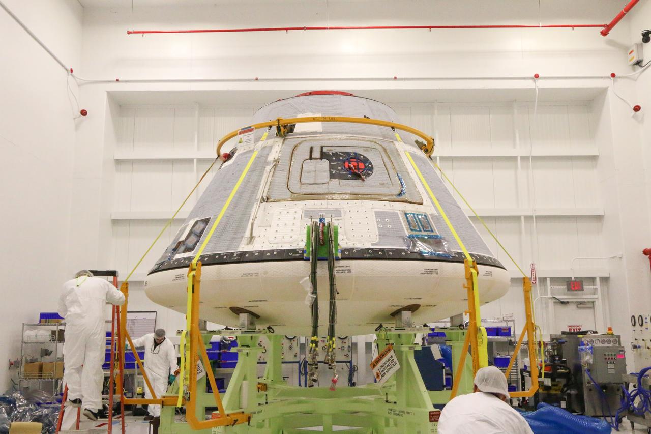 Inside the Commercial Crew and Cargo Processing Facility (C3PF) at NASA's Kennedy Space Center in Florida on Nov. 11, 2018, the spacecraft destined to fly astronauts to the International Space Station in Boeing's Crew Flight Test (CFT) is prepared for transport to the company's testing facilities in El Segundo, California. The company's CST-100 Starliner will be undergoing a series of environmental tests designed to simulate what the spacecraft will experience during different stages of flight as part of NASA's Commercial Crew Program (CCP). The agency's CCP will return human spaceflight launches to U.S. soil, providing safe, reliable and cost-effective access to low-Earth orbit on systems that meet our safety and mission requirements.