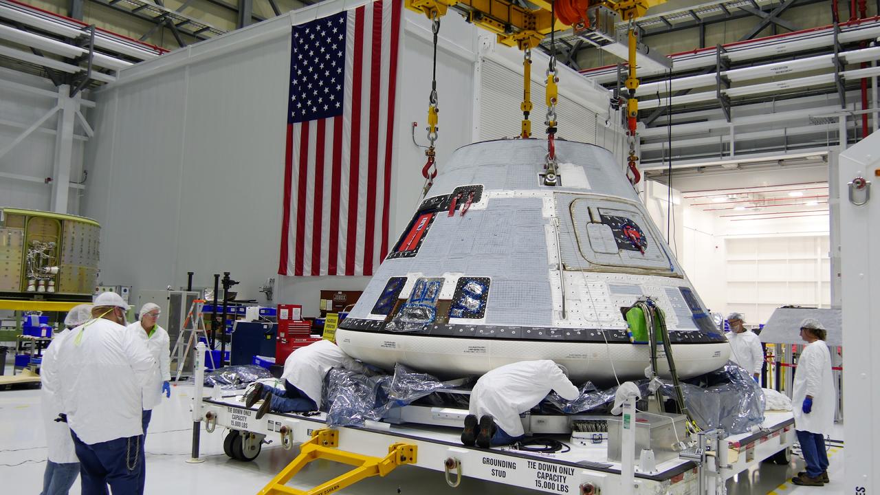 On Nov. 12, 2018, inside the Commercial Crew and Cargo Processing Facility (C3PF) at NASA's Kennedy Space Center in Florida, technicians and engineers prepare Boeing's CST-100 Starliner for transport to the company's testing facilities in El Segundo, California. The spacecraft is destined to fly astronauts to the International Space Station in Boeing's Crew Flight Test (CFT) as part of NASA's Commercial Crew Program (CCP). The Starliner will be undergoing a series of environmental tests designed to simulate what the spacecraft will experience during different stages of flight. The agency's CCP will return human spaceflight launches to U.S. soil, providing safe, reliable and cost-effective access to low-Earth orbit on systems that meet our safety and mission requirements.