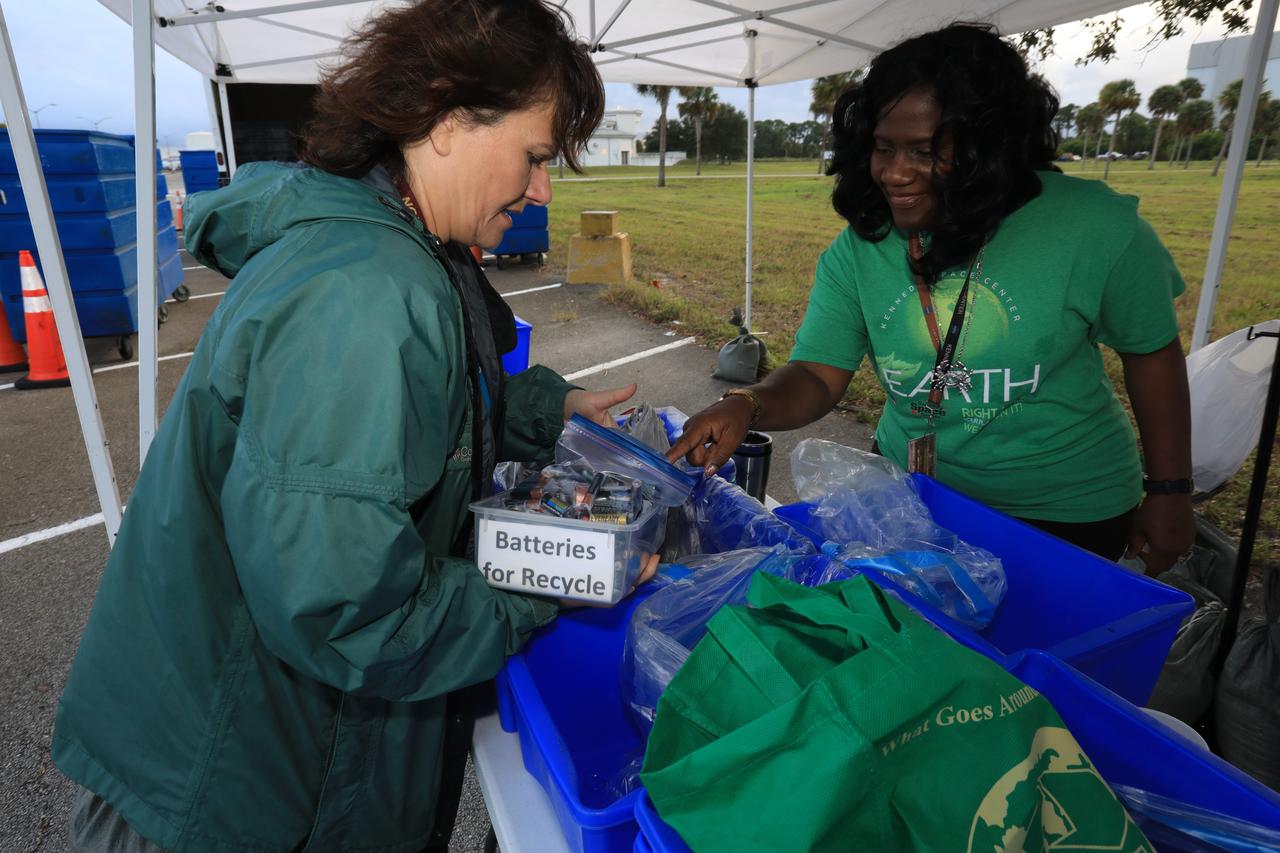 In the parking lot of the Vehicle Assembly Building at NASA's Kennedy Space Center in Florida, employees turn in used household material for recycling as part of America Recycles Day (ARD). The annual event is a nationally recognized initiative dedicated to promoting recycling in the United States. This year, KSC is partnered with Goodwill Industries and several other local organizations to receive donation material from employees such as gently used household items, personal electronic waste, greeting cards and serviceable eyeglasses.
