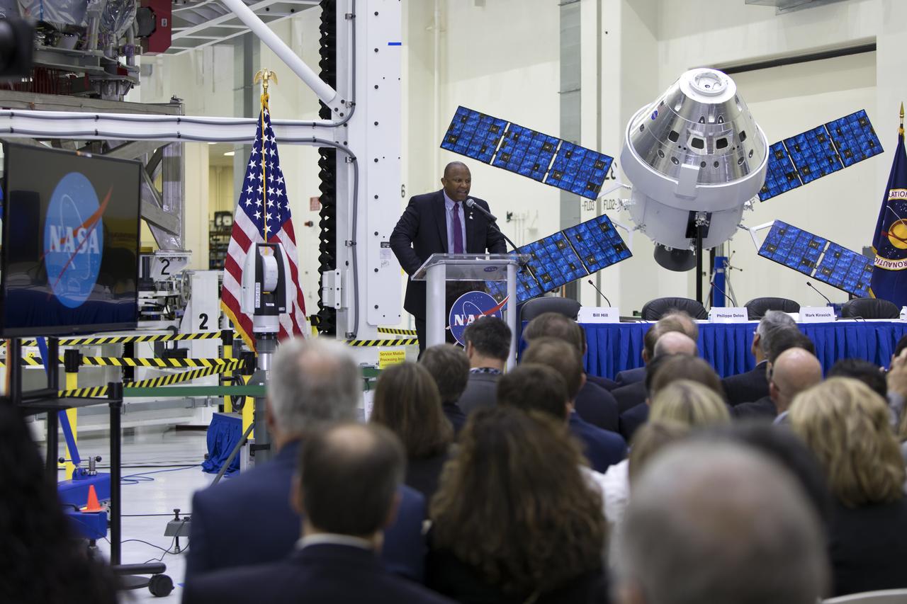 Kennedy Space Center Associate Director Kelvin Manning speaks to guests at NASA's "Powering Exploration Mission-1" ceremony in the high bay of the Neil Armstrong Operations and Checkout Building at the center on Nov. 16, 2018. The event was held to mark a major milestone, the arrival of the European Service Module (ESM) for Orion's Exploration Mission-1. The service module, built by the European Space Agency, will supply the main propulsion system and power to the Orion spacecraft during EM-1, a mission to the Moon. The ESM also will house air and water for astronauts on future missions. EM-1 will be an uncrewed flight test that will provide a foundation for human deep space exploration to destinations beyond Earth orbit. EM-1 will be the first integrated test of NASA's Space Launch System, Orion and the ground systems at Kennedy.