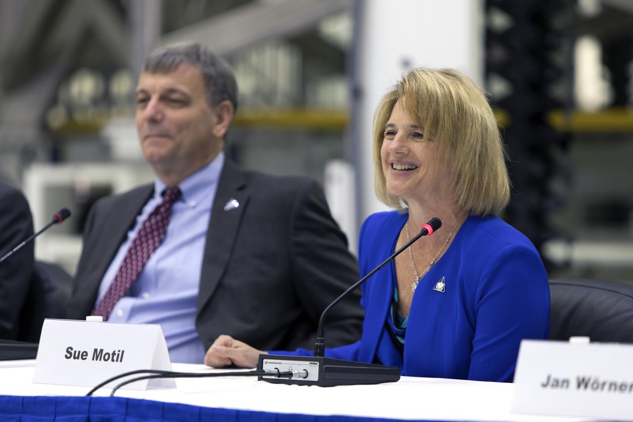 During a "Powering Exploration Mission-1" ceremony in the Neil Armstrong Operations and Checkout Building high bay at NASA's Kennedy Space Center on Nov. 16, 2018, Mark Kirasich, left, Orion Program manager at the agency's Johnson Space Center in Houston; and Sue Motil, Orion European Service Module integration manager at the agency's Glenn Research Center, answer questions. The event was held to mark a major milestone, the arrival of the European Service Module (ESM) for Orion's Exploration Mission-1. The service module, built by the European Space Agency, will supply the main propulsion system and power to the Orion spacecraft during EM-1, a mission to the Moon. The ESM also will house air and water for astronauts on future missions. EM-1 will be an uncrewed flight test that will provide a foundation for human deep space exploration to destinations beyond Earth orbit. EM-1 will be the first integrated test of NASA's Space Launch System, Orion and the ground systems at Kennedy.