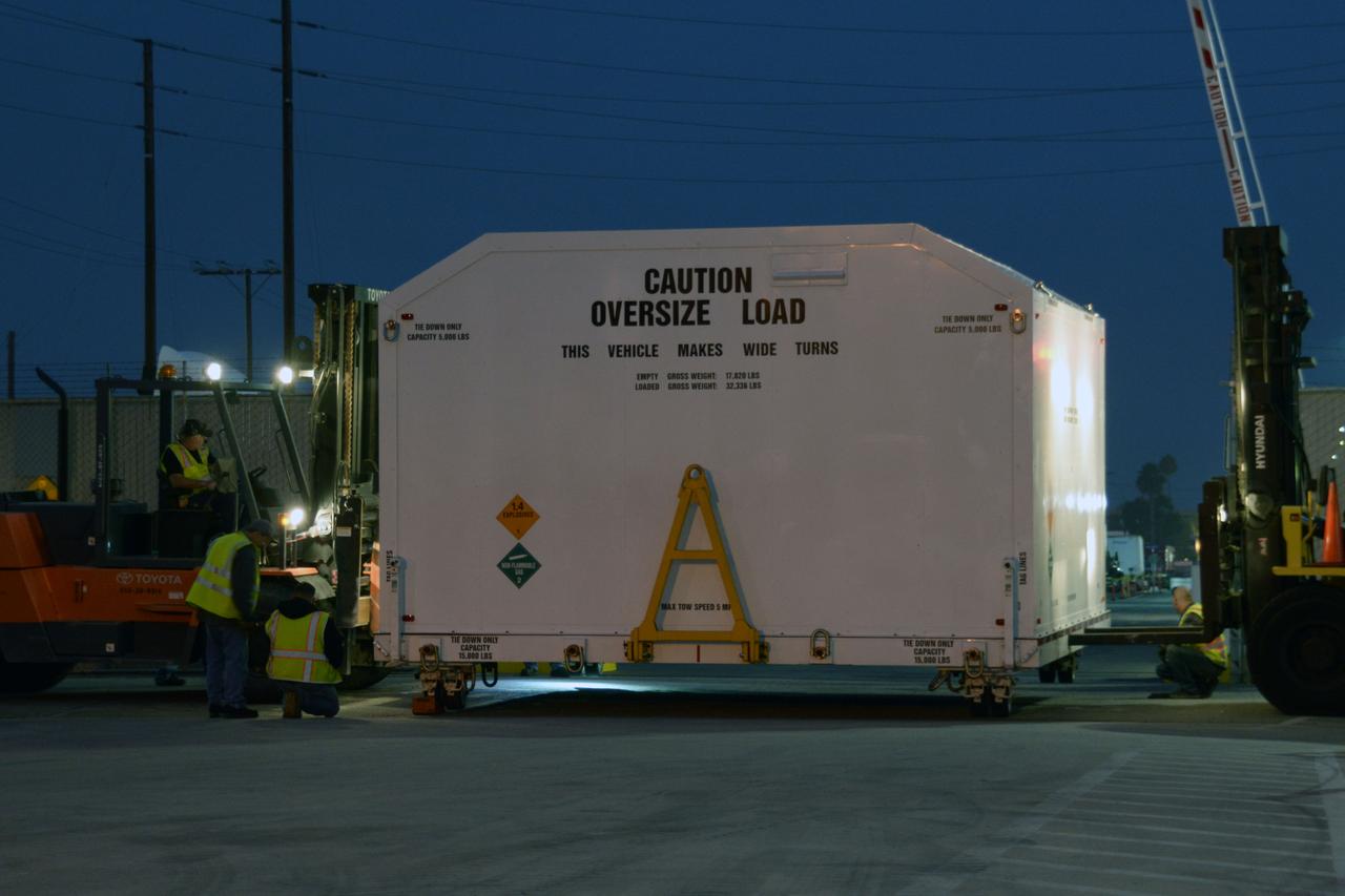Packed in its shipping container, the spacecraft destined to fly astronauts to the International Space Station in Boeing's Crew Flight Test (CFT) arrives at the company's testing facilities in El Segundo, California, on Nov. 21, 2018. The company's CST-100 Starliner will be undergoing a series of environmental tests designed to simulate what it will experience during different stages of flight as part of NASA's Commercial Crew Program (CCP). The agency's CCP will return human spaceflight launches to U.S. soil, providing safe, reliable and cost-effective access to low-Earth orbit on systems that meet our safety and mission requirements.