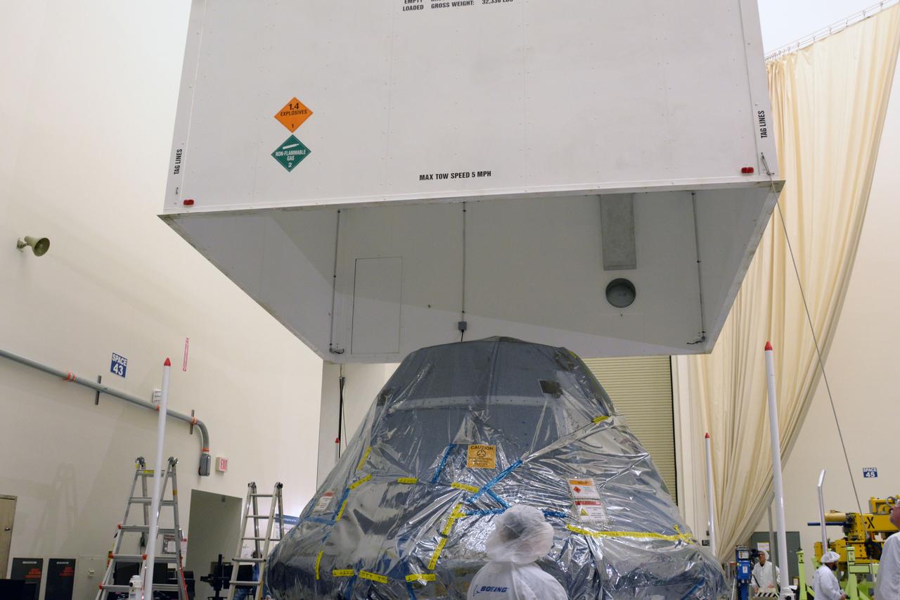 The spacecraft destined to fly astronauts to the International Space Station in Boeing's Crew Flight Test (CFT) is removed from its shipping container inside the company's testing facilities in El Segundo, California, on Nov. 21, 2018. The company's CST-100 Starliner will be undergoing a series of environmental tests designed to simulate what it will experience during different stages of flight as part of NASA's Commercial Crew Program (CCP). The agency's CCP will return human spaceflight launches to U.S. soil, providing safe, reliable and cost-effective access to low-Earth orbit on systems that meet our safety and mission requirements.