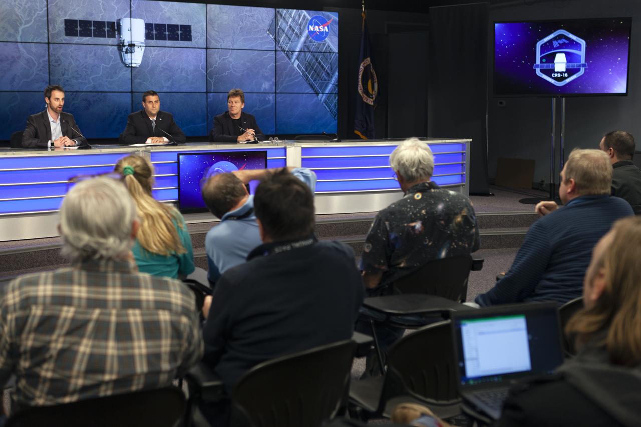 In the Press Site auditorium of NASA's Kennedy Space Center in Florida, from left, Joshua Santora of NASA Communications, Joel Montalbano, deputy International Space Station program manager at NASA's Johnson Space Center in Houston, and Hans Koenigsmann, vice president of Build and Flight Reliability for SpaceX, speak to media at a post-launch news conference following the liftoff of SpaceX CRS-16. The flight is a commercial resupply services mission to the International Space Station. SpaceX CRS-16 lifted off atop a Falcon 9 rocket from Space Launch Complex 40 at Cape Canaveral Air Force Station at 1:16 p.m. EST, Dec. 5, 2018, with supplies and equipment and new science experiments for technology research.