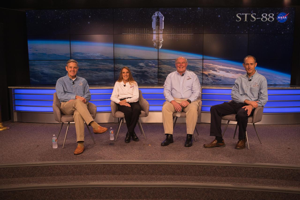 From left, Kennedy Space Center Director and STS-88 commander Bob Cabana, along with STS-88 mission specialists Nancy Currie-Gregg, Jerry Ross and Jim Newman, are recognized Dec. 10, 2018, at Kennedy Space Center in Florida during a 20th anniversary celebration of the first International Space Station assembly mission. The STS-88 mission paved the way for humans to live and work on the space station.