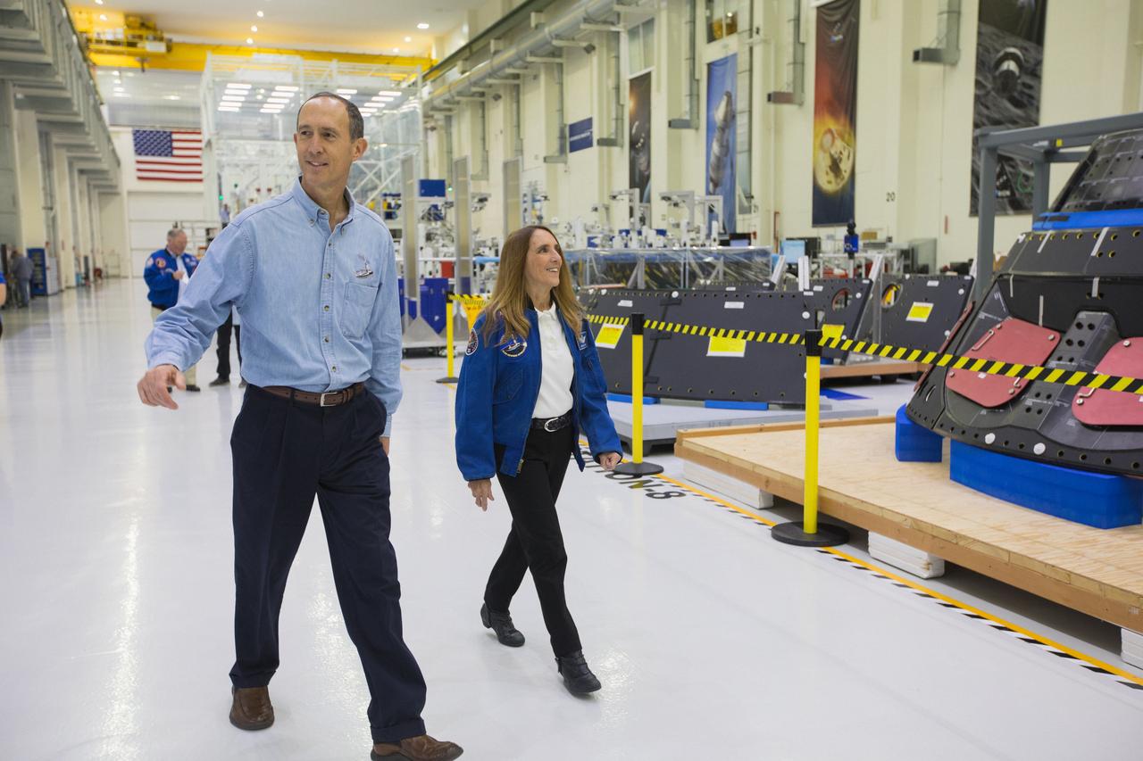 From left, STS-88 mission specialists Jim Newman and Nancie Currie-Gregg tour the Neil Armstrong Operations & Checkout building at Kennedy Space Center on Dec. 10, 2018. Newman and Currie-Gregg were visiting the Florida spaceport as part of a 20th anniversary celebration of STS-88, the first International Space Station assembly mission.