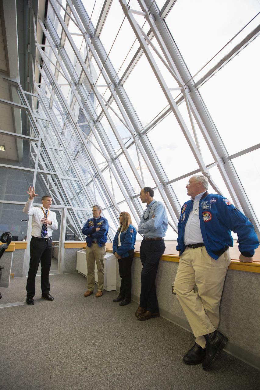 Chief NASA Test Director Jeremy Graeber, left, talks with members of the STS-88 crew inside the Launch Control Center at Kennedy Space Center in Florida on Dec. 10, 2018. They are, from left, Commander Bob Cabana, and mission specialists Nancy Currie-Gregg, Jim Newman and Jerry Ross. Earlier in the day, the group held a panel discussion in recognition of the 20th anniversary of the mission.