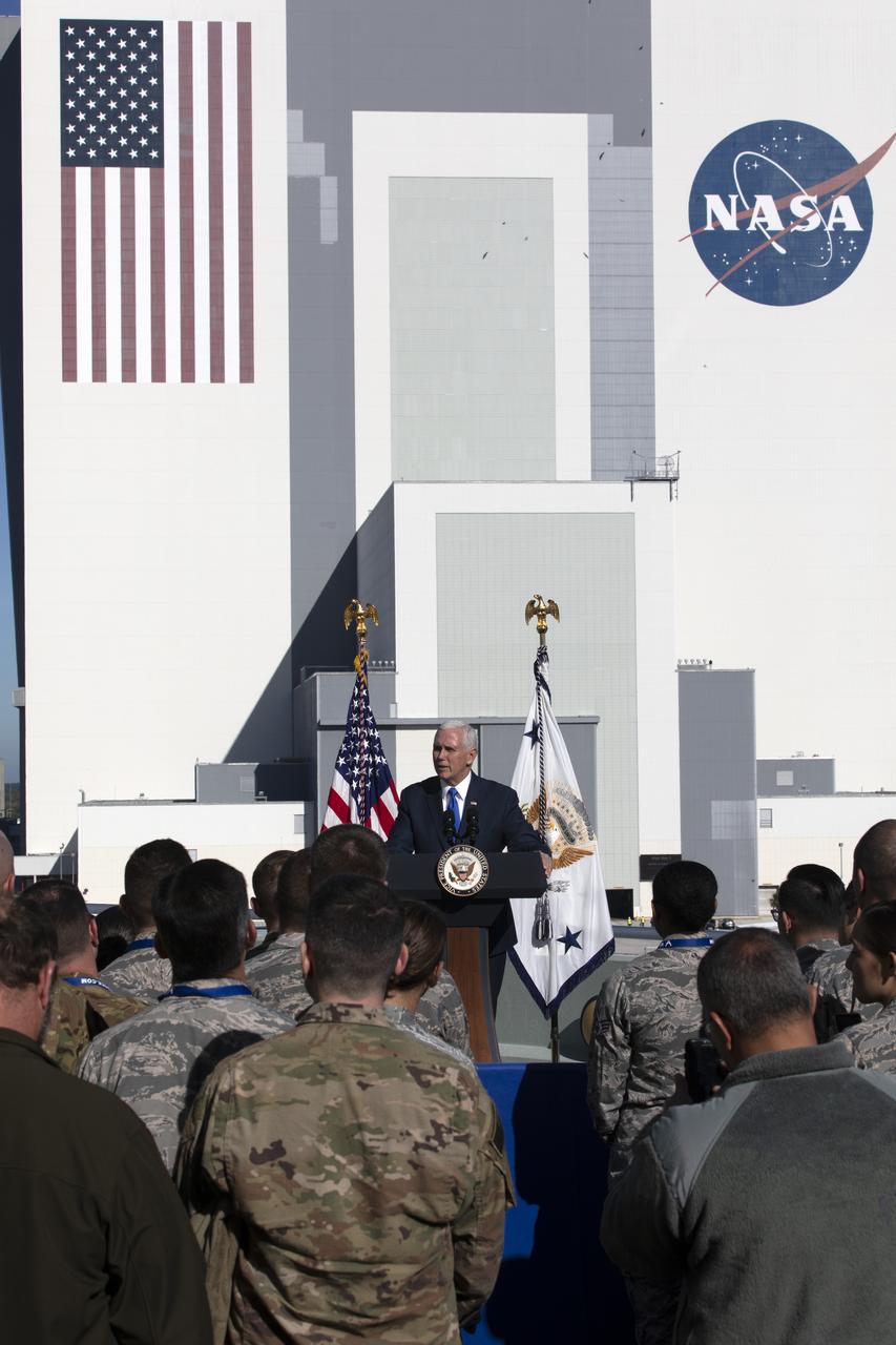 At the Operations and Support Building II at NASA's Kennedy Space Center in Florida, Vice President Mike Pence addresses members of the U.S. Air Force after the scrubbed launch attempt of SpaceX's Falcon 9 rocket carrying the Air Force's GPS III satellite from Space Launch Complex 40 on Cape Canaveral Air Force Station on Dec. 18, 2018.