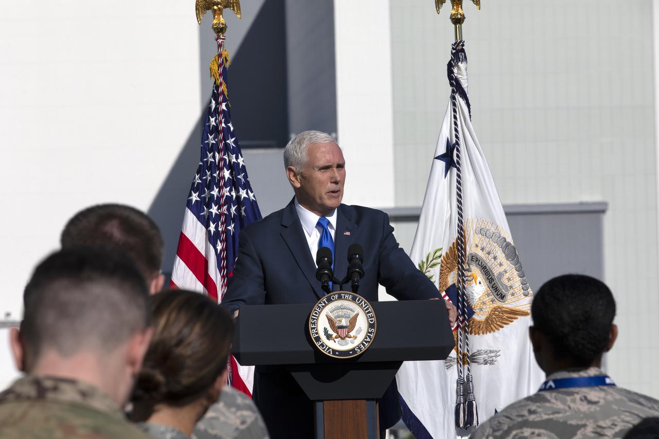 At the Operations and Support Building II at NASA's Kennedy Space Center in Florida, Vice President Mike Pence addresses members of the U.S. Air Force after the scrubbed launch attempt of SpaceX's Falcon 9 rocket carrying the Air Force's GPS III satellite from Space Launch Complex 40 on Cape Canaveral Air Force Station on Dec. 18, 2018.