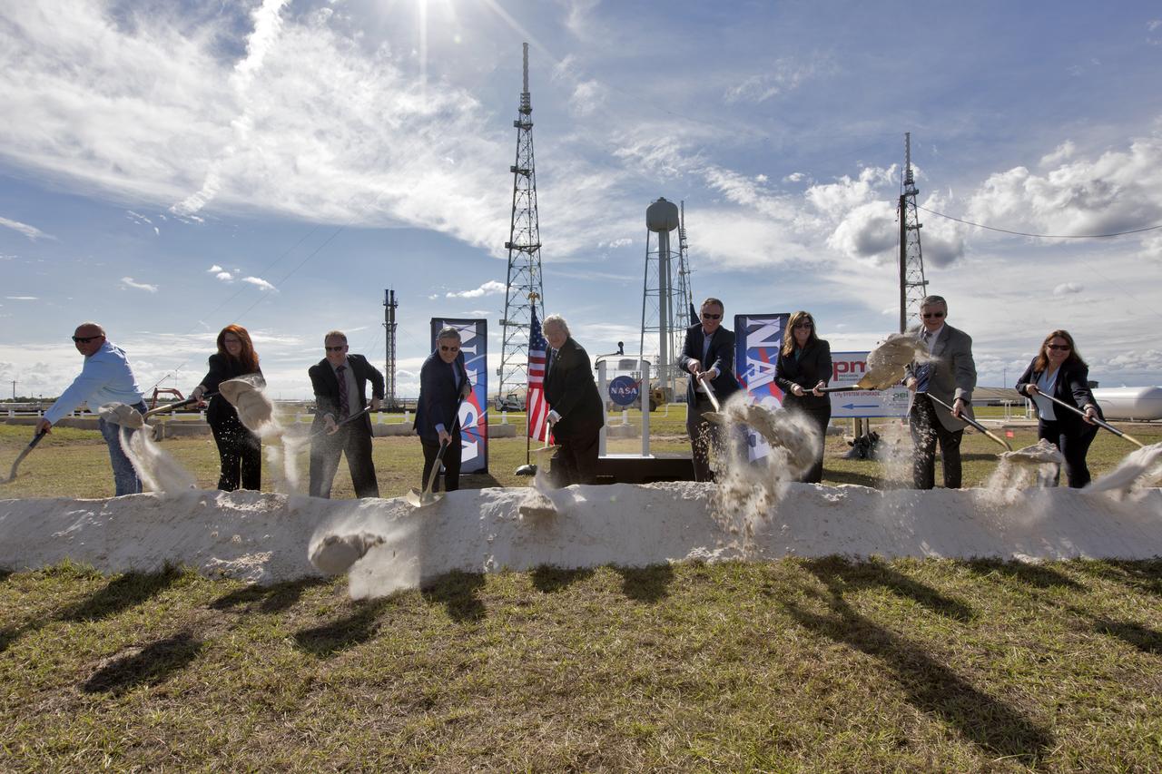 On Dec. 19, 2018, at NASA Kennedy Space Center's Launch Complex 39B, agency and contractor managers break ground for a new liquid hydrogen tank. Participating, from the left, are Todd Gray, president of Precision Mechanical, prime contractor for the project; Charlie Blackwell-Thompson, launch director; Shawn Quinn, director of Engineering; Bob Cabana, center director; Bill Hill, deputy associate administrator for Exploration Systems Development at NASA Headquarters in Washington; Mike Bolger, program manager for Exploration Ground Systems (EGS); Jennifer Kunz, deputy program manager for EGS, Andy Allen, general manager for Jacobs, NASA's Test and Operations Support Contractor; and Regina Spellman, launch pad senior project manager in EGS. The storage facility will hold 1.25 million gallons of the propellant for NASA's Space Launch System rocket designed to boost the agency's Orion spacecraft, sending humans to distant destinations such as the Moon and Mars.
