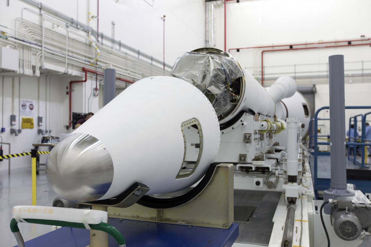 Inside the Launch Abort System Facility (LASF) at NASA’s Kennedy Space Center in Florida, the Launch Abort System (LAS) that will be used for the Orion Ascent Abort-2 (AA-2) Flight Test is being assembled on Feb. 5, 2019. AA-2 is a full-stress test of the LAS, scheduled for Spring 2019. AA-2 will launch from Space Launch Complex 46, carrying a fully functional LAS and a 22,000-pound Orion test vehicle to an altitude of 31,000 feet and traveling at more than 1,000 miles an hour. The test will verify the LAS can steer the crew module and astronauts aboard to safety in the event of an issue with the Space Launch System (SLS) rocket when the spacecraft is under the highest aerodynamic loads it will experience during a rapid climb into space. NASA's Orion and Exploration Ground Systems programs and contractors from Jacob's and Northrop Grumman in conjunction with the Air Force Space and Missile Center's Launch Operations branch are performing flight operations for AA-2.