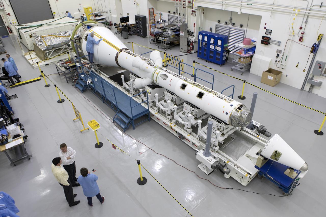 In this view from above inside the Launch Abort System Facility (LASF) at NASA’s Kennedy Space Center in Florida, the Launch Abort System (LAS) that will be used for the Orion Ascent Abort-2 (AA-2) Flight Test is being assembled on Feb. 5, 2019. AA-2 is a full-stress test of the LAS, scheduled for Spring 2019. AA-2 will launch from Space Launch Complex 46, carrying a fully functional LAS and a 22,000-pound Orion test vehicle to an altitude of 31,000 feet and traveling at more than 1,000 miles an hour. The test will verify the LAS can steer the crew module and astronauts aboard to safety in the event of an issue with the Space Launch System (SLS) rocket when the spacecraft is under the highest aerodynamic loads it will experience during a rapid climb into space. NASA's Orion and Exploration Ground Systems programs and contractors from Jacob's and Northrop Grumman in conjunction with the Air Force Space and Missile Center's Launch Operations branch are performing flight operations for AA-2.