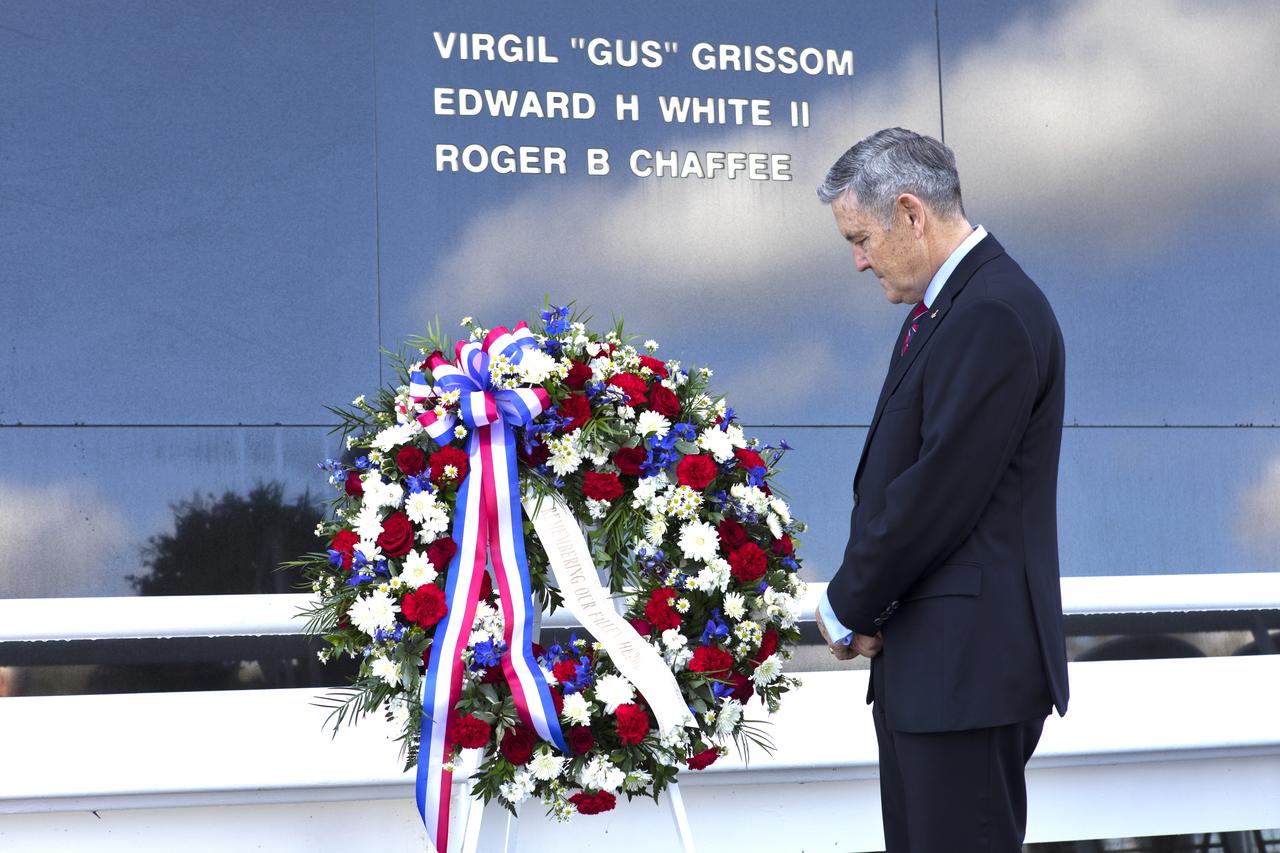 Kennedy Center Director Bob Cabana stands in a moment of silence after placing a memorial wreath before the Space Mirror Memorial at the Kennedy Space Center Visitor Complex during this year’s Day of Remembrance ceremony. Each year, Kennedy employees and guests gather with others throughout NASA to honor those astronauts who have fallen in the pursuit of space exploration.