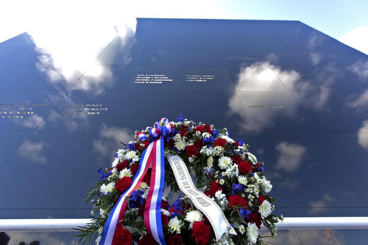A memorial wreath stands before the Space Mirror Memorial at the Kennedy Space Center Visitor Complex during this year’s Day of Remembrance ceremony. The memorial, a 42-foot-high by 50-foot-wide granite monument, displays the names of the fallen astronauts from Apollo 1, space shuttles Challenger and Columbia, as well as others who have lost their lives while on NASA missions or in training. Each year, Kennedy employees and guests gather with others throughout NASA to honor those astronauts who have fallen in the pursuit of space exploration.
