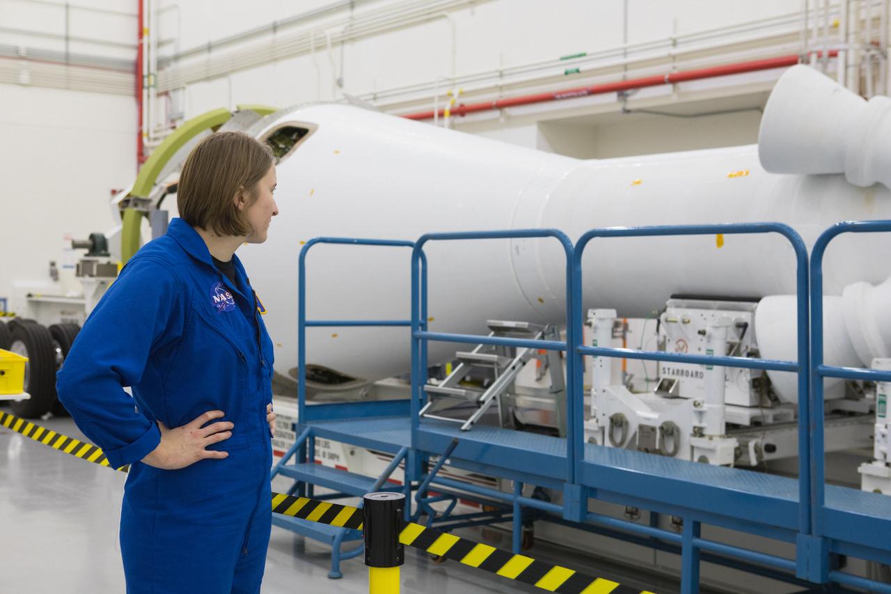 Astronaut candidate Kayla Barron tours the Launch Abort System Facility (LASF) at NASA’s Kennedy Space Center in Florida on Feb. 12, 2019. Barron viewed the Launch Abort System (LAS) that will be used for the Orion Ascent Abort-2 (AA-2) Flight Test. AA-2 is a full-stress test of the LAS, scheduled for Spring 2019. AA-2 will launch from Space Launch Complex 46, carrying a fully functional LAS and a 22,000-pound Orion test vehicle to an altitude of 31,000 feet and traveling at more than 1,000 miles an hour. The test will verify the LAS can steer the crew module and astronauts aboard to safety in the event of an issue with the Space Launch System (SLS) rocket when the spacecraft is under the highest aerodynamic loads it will experience during a rapid climb into space. NASA's Orion and Exploration Ground Systems programs and contractors from Jacob's and Northrop Grumman in conjunction with the Air Force Space and Missile Center's Launch Operations branch are performing flight operations for AA-2.