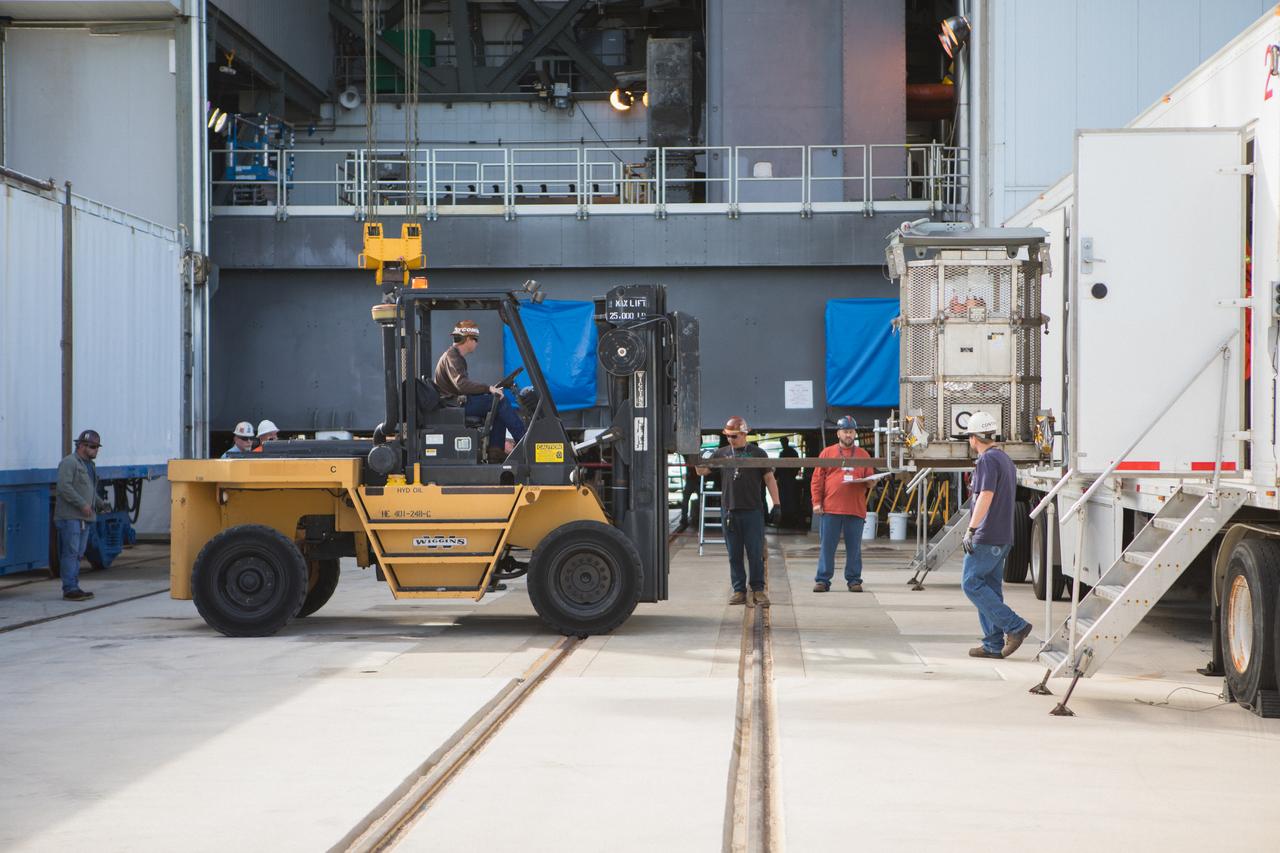 A test version of the Multi-Mission Radioisotope Thermoelectric Generator (MMRTG) for NASA’s Mars 2020 mission arrives at the United Launch Alliance Vertical Integration Facility (VIF) at Space Launch Complex 41 at Cape Canaveral Air Force Station in Florida on Feb. 15, 2019. The MMRTG simulator will be used to practice operations and procedures for carefully hoisting it up and into the VIF. The Mars 2020 rover mission is targeted to launch in July 2020 on a ULA Atlas V rocket from Pad 41. Mars 2020 is part of NASA’s Mars Exploration Program, a long-term effort of robotic exploration of the Red Planet. The rover will search for habitable conditions in the ancient past and signs of past microbial life on Mars.