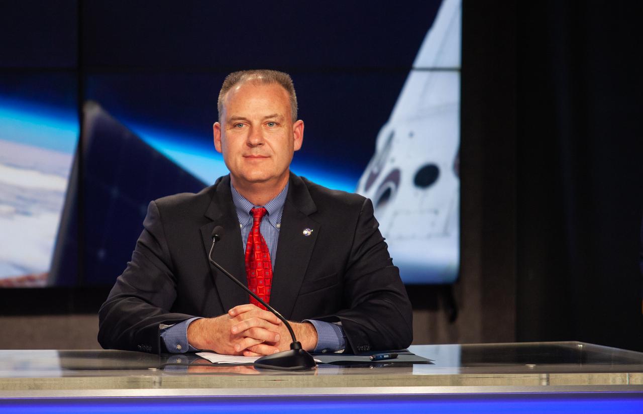 In Kennedy Space Center’s Press Site auditorium, agency and industry leaders speak to members of the media on Friday, Feb. 22, during the post-flight readiness review briefing for the SpaceX Demo-1 Commercial Crew Program (CCP) mission to the International Space Station. Pictured is Norm Knight, deputy director, NASA Johnson Space Center Flight Operations. The inaugural uncrewed flight of the SpaceX Crew Dragon, known as Demo-1, is targeted to lift off from Kennedy’s Launch Complex 39A on Saturday, March 2. EST. A SpaceX Falcon 9 rocket will launch the Crew Dragon on a mission designed to validate end-to-end systems and capabilities, leading to certification to fly crew.