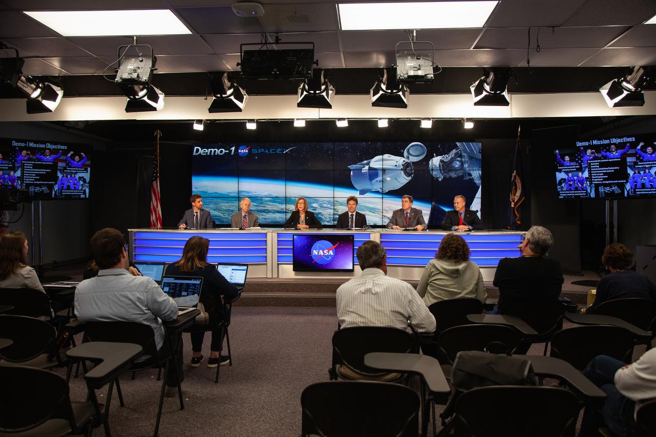 In Kennedy Space Center’s Press Site auditorium, agency and industry leaders speak to members of the media on Friday, Feb. 22, during the post-flight readiness review briefing for the SpaceX Demo-1 Commercial Crew Program (CCP) mission to the International Space Station. From left are: Josh Finch of NASA Communications; William Gerstenmaier, associate administrator, NASA Human Exploration and Operations; Kathy Lueders, manager, NASA Commercial Crew Program; Hans Koenigsmann, vice president, Build and Flight Reliability, SpaceX; Kirk Shireman, International Space Station Program manager; and Norm Knight, deputy director, NASA Johnson Space Center Flight Operations. The inaugural uncrewed flight of the SpaceX Crew Dragon, known as Demo-1, is targeted to lift off from Kennedy’s Launch Complex 39A on Saturday, March 2. EST. A SpaceX Falcon 9 rocket will launch the Crew Dragon on a mission designed to validate end-to-end systems and capabilities, leading to certification to fly crew.