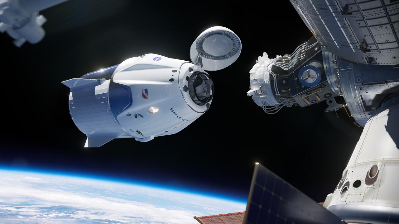 This artist illustration shows the SpaceX Crew Dragon spacecraft docking to the International Space Station. SpaceX is one of two American companies working with NASA to design, build, test and operate safe, reliable and cost-effective human transportation systems, restoring the nation’s human launch capability to and from the station.