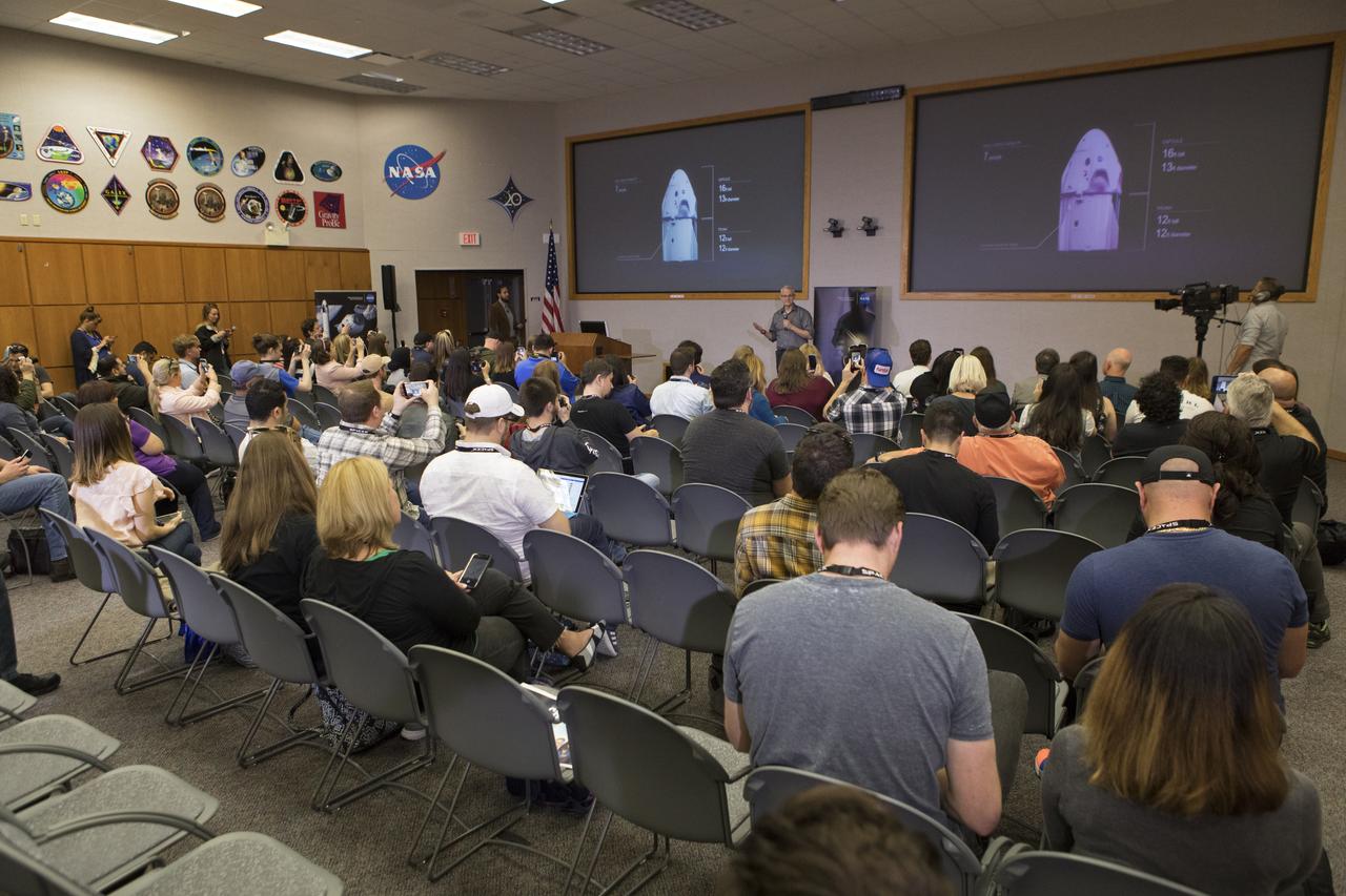 Benji Reed, director of Crew Mission Management, SpaceX, speaks to members of the media Thursday, Feb. 28, in the Kennedy Space Center’s Mission Briefing Room of the Neil Armstrong Operations and Checkout Building. The briefing focused on launch of the SpaceX Demo-1 Commercial Crew Program mission to the International Space Station. The inaugural flight of the Crew Dragon, known as Demo-1, will be uncrewed, lifting off atop a SpaceX Falcon 9 rocket from Launch Complex 39A at Kennedy Saturday, March 2, at 2:49 a.m. EST. The mission is designed to validate end-to-end systems and capabilities, leading to certification to fly crew. NASA has worked with SpaceX and Boeing in developing the CCP spacecraft to facilitate new human spaceflight systems launching from U.S. soil with the goal of safe, reliable and cost-effective access to low-Earth orbit destinations such as the space station.