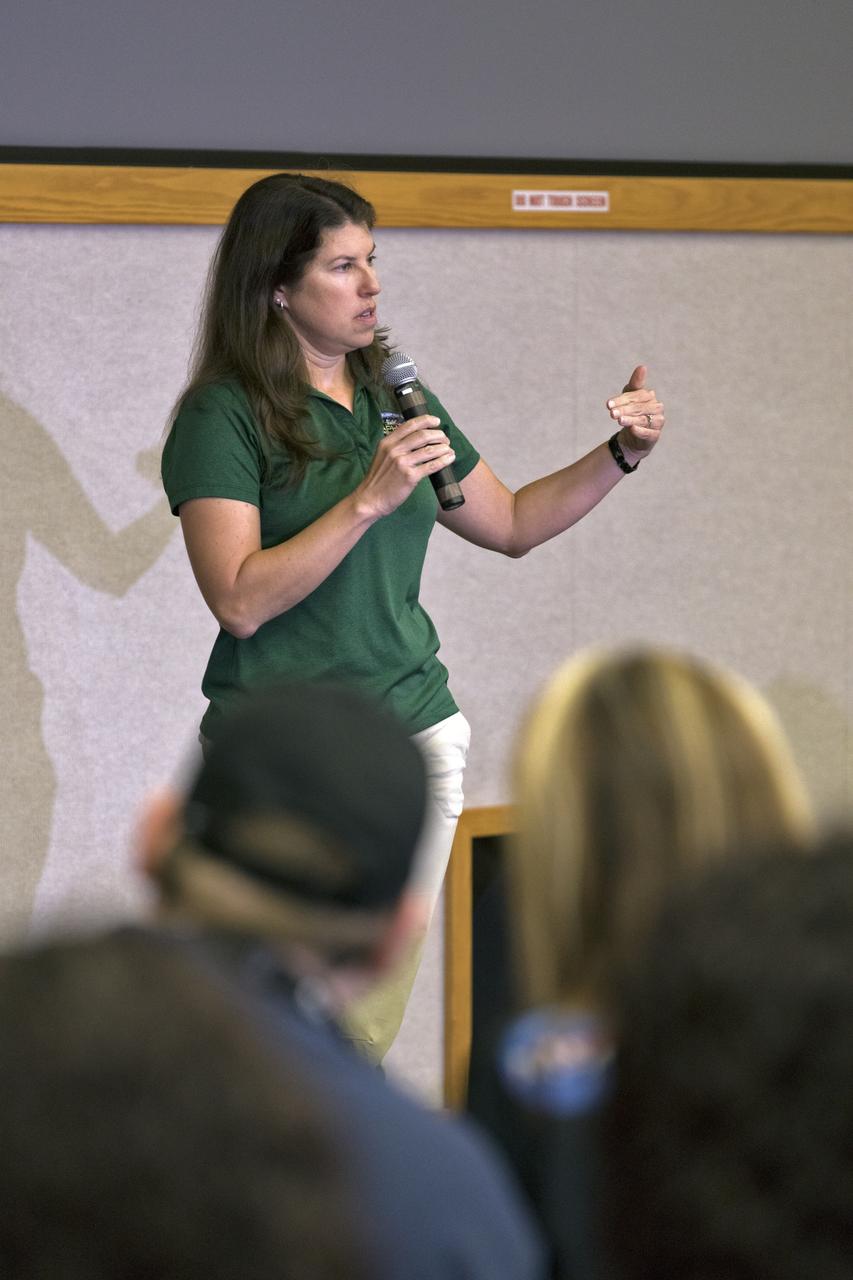 Kelli Maloney, NASA Ground Systems lead engineer, speaks to members of the media Thursday, Feb. 28, in the Kennedy Space Center’s Mission Briefing Room of the Neil Armstrong Operations and Checkout Building. The briefing focused on launch of the SpaceX Demo-1 Commercial Crew Program mission to the International Space Station. The inaugural flight of the Crew Dragon, known as Demo-1, will be uncrewed, lifting off atop a SpaceX Falcon 9 rocket from Launch Complex 39A at Kennedy Saturday, March 2, at 2:49 a.m. EST. The mission is designed to validate end-to-end systems and capabilities, leading to certification to fly crew. NASA has worked with SpaceX and Boeing in developing the CCP spacecraft to facilitate new human spaceflight systems launching from U.S. soil with the goal of safe, reliable and cost-effective access to low-Earth orbit destinations such as the space station.