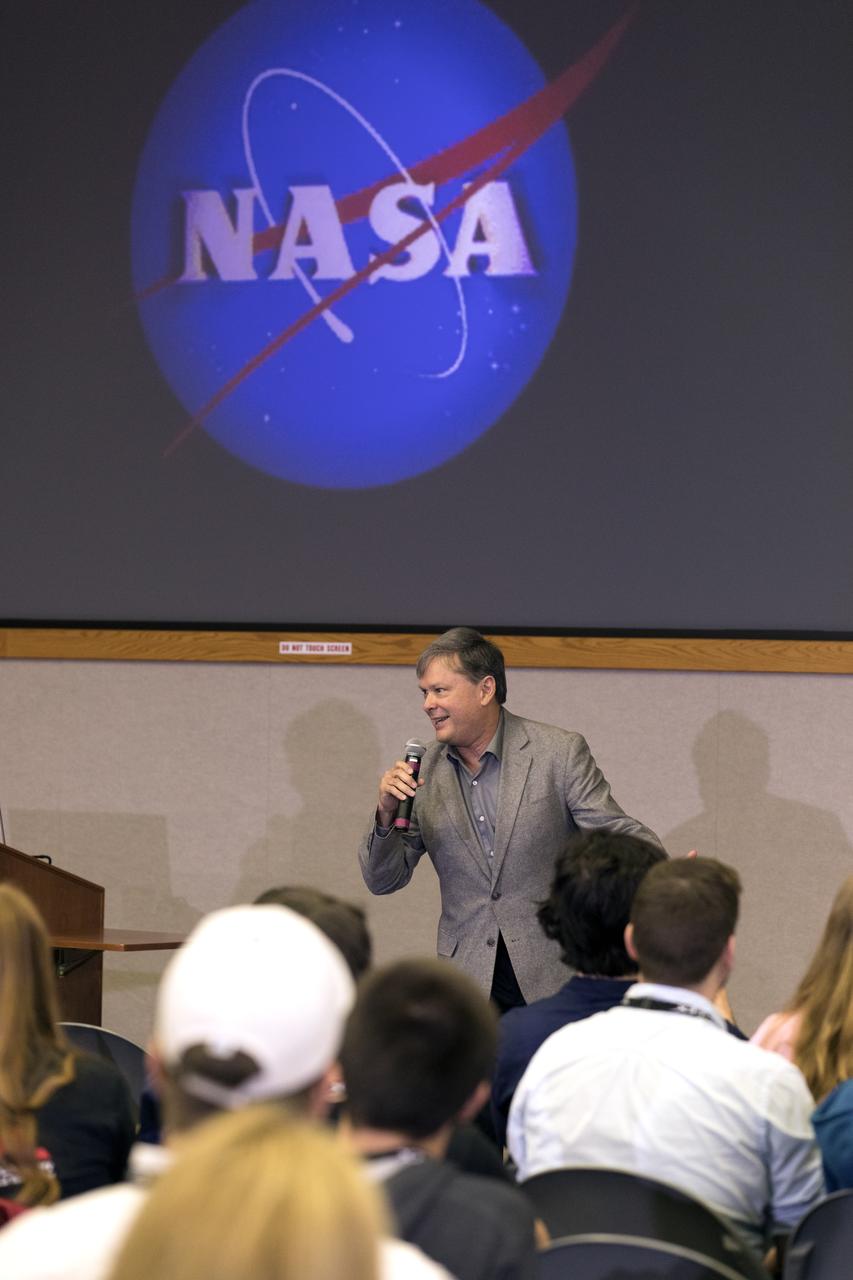 David Brady, ISS assistant program scientist, speaks to members of the media Thursday, Feb. 28, in the Kennedy Space Center’s Mission Briefing Room of the Neil Armstrong Operations and Checkout Building. The briefing focused on launch of the SpaceX Demo-1 Commercial Crew Program mission to the International Space Station. The inaugural flight of the Crew Dragon, known as Demo-1, will be uncrewed, lifting off atop a SpaceX Falcon 9 rocket from Launch Complex 39A at Kennedy Saturday, March 2, at 2:49 a.m. EST. The mission is designed to validate end-to-end systems and capabilities, leading to certification to fly crew. NASA has worked with SpaceX and Boeing in developing the CCP spacecraft to facilitate new human spaceflight systems launching from U.S. soil with the goal of safe, reliable and cost-effective access to low-Earth orbit destinations such as the space station.
