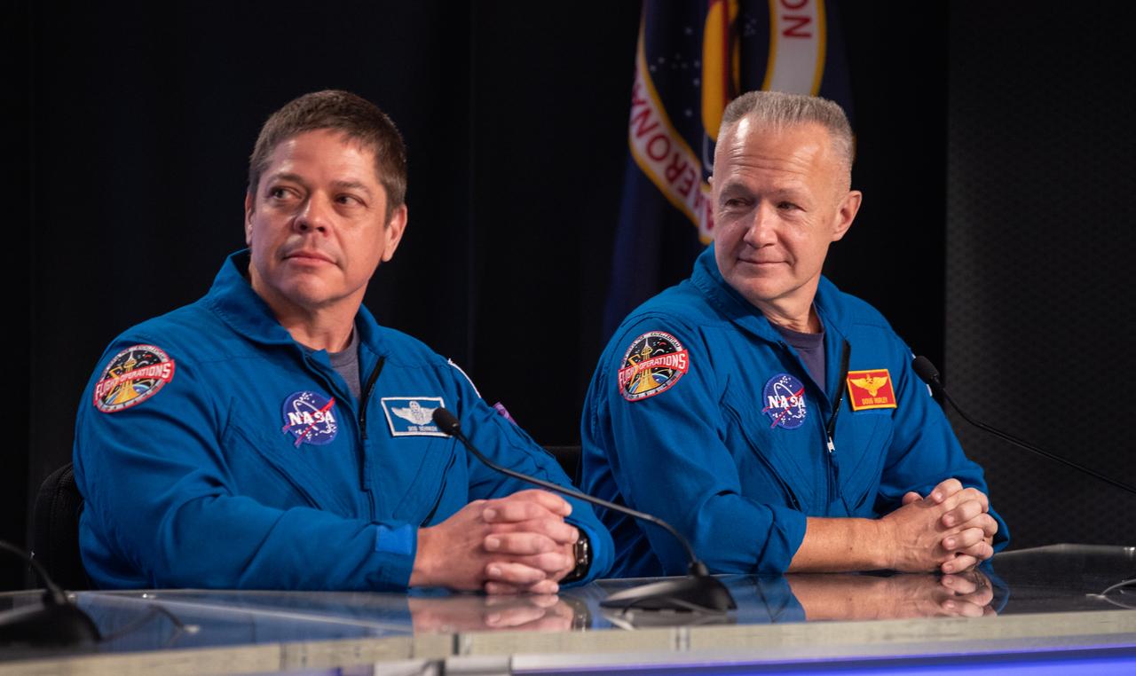 NASA astronauts Bob Behnken, left, and Doug Hurley are introduced to members of the media during a post launch news conference in Kennedy Space Center’s Press Site auditorium following the March 2, 2:49 a.m. EST launch of the SpaceX Demo-1 Commercial Crew Program (CCP) mission to the International Space Station. The Crew Dragon’s trip to the space station is designed to validate end-to-end systems and capabilities, leading to certification to fly crew. NASA has worked with SpaceX and Boeing in developing the CCP spacecraft to facilitate new human spaceflight systems launching from U.S. soil with the goal of safe, reliable and cost-effective access to low-Earth orbit destinations, such as the space station.