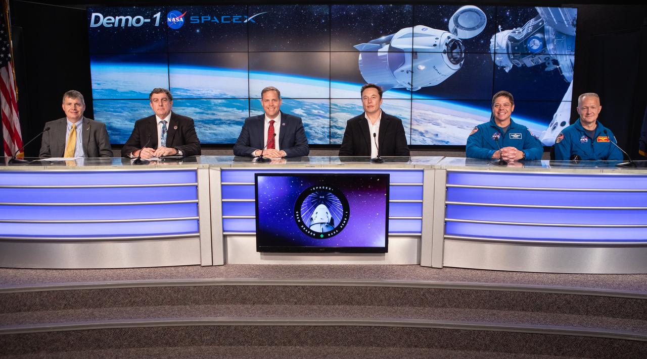 In Kennedy Space Center’s Press Site auditorium, agency and industry leaders speak to members of the media during a post launch news conference following the March 2, 2:49 a.m. EST launch of the SpaceX Demo-1 Commercial Crew Program (CCP) mission to the International Space Station. From left are: Steve Stich, NASA launch manager, Commercial Crew Program; Kirk Shireman, manager, International Space Station Program; Jim Bridenstine, NASA administrator; Elon Musk, CEO and lead designer, SpaceX; Bob Behnken, NASA astronaut and Doug Hurley, NASA astronaut. The Crew Dragon’s trip to the space station is designed to validate end-to-end systems and capabilities, leading to certification to fly crew. NASA has worked with SpaceX and Boeing in developing the CCP spacecraft to facilitate new human spaceflight systems launching from U.S. soil with the goal of safe, reliable and cost-effective access to low-Earth orbit destinations, such as the space station.