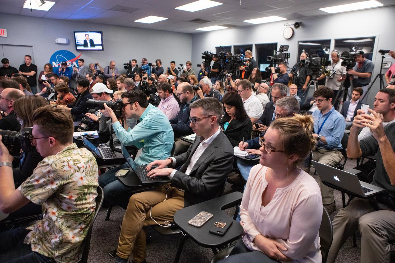 Members of the media gather in Kennedy Space Center’s Press Site auditorium during a post launch news conference with agency and industry leaders following the March 2, 2:49 a.m. EST launch of the SpaceX Demo-1 Commercial Crew Program (CCP) mission to the International Space Station. The Crew Dragon’s trip to the space station is designed to validate end-to-end systems and capabilities, leading to certification to fly crew. NASA has worked with SpaceX and Boeing in developing the CCP spacecraft to facilitate new human spaceflight systems launching from U.S. soil with the goal of safe, reliable and cost-effective access to low-Earth orbit destinations, such as the space station.