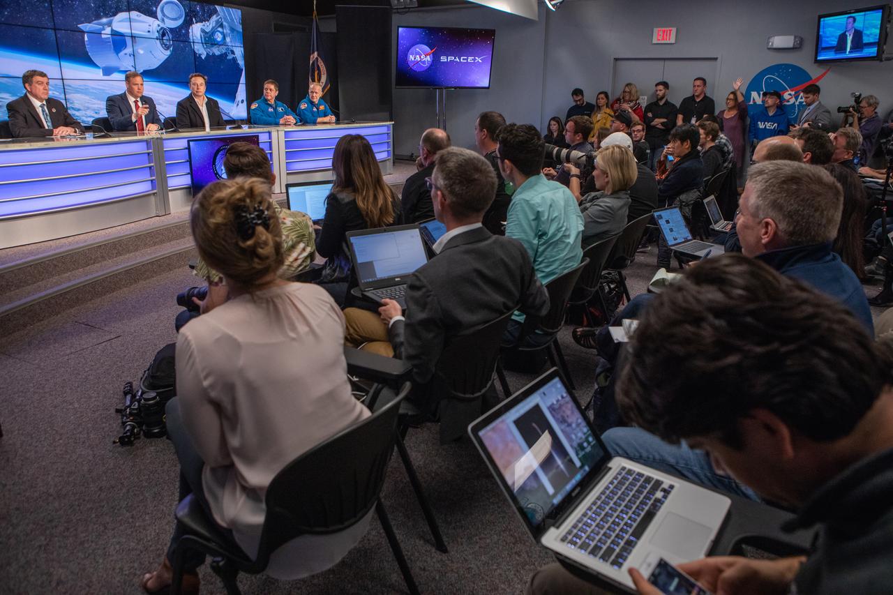 Members of the media gather in Kennedy Space Center’s Press Site auditorium during a post launch news conference with agency and industry leaders following the March 2, 2:49 a.m. EST launch of the SpaceX Demo-1 Commercial Crew Program (CCP) mission to the International Space Station. The Crew Dragon’s trip to the space station is designed to validate end-to-end systems and capabilities, leading to certification to fly crew. NASA has worked with SpaceX and Boeing in developing the CCP spacecraft to facilitate new human spaceflight systems launching from U.S. soil with the goal of safe, reliable and cost-effective access to low-Earth orbit destinations, such as the space station.