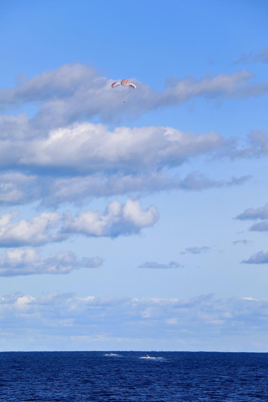SpaceX’s Crew Dragon is guided by four parachutes toward the Atlantic Ocean on March 8 after returning from the International Space Station on the Demo-1 mission. The uncrewed spacecraft docked to the orbiting laboratory on March 3, following a 2:49 a.m. EST liftoff aboard a SpaceX Falcon 9 rocket from Launch Complex 39A at NASA’s Kennedy Space Center in Florida on March 2. Crew Dragon made 18 orbits of Earth before successfully attaching to the space station. The spacecraft undocked at 2:32 a.m., March 8, splashing down in the Atlantic Ocean, about 200 miles off Florida’s east coast at 8:45 a.m. SpaceX’s inaugural flight with NASA’s Commercial Crew Program is the first flight test of a space system designed for humans built and operated by a commercial company through a public-private partnership. NASA and SpaceX will use data from Demo-1 to further prepare for Demo-2, the crewed flight test that will carry NASA astronauts Bob Behnken and Doug Hurley to the International Space Station later this year.