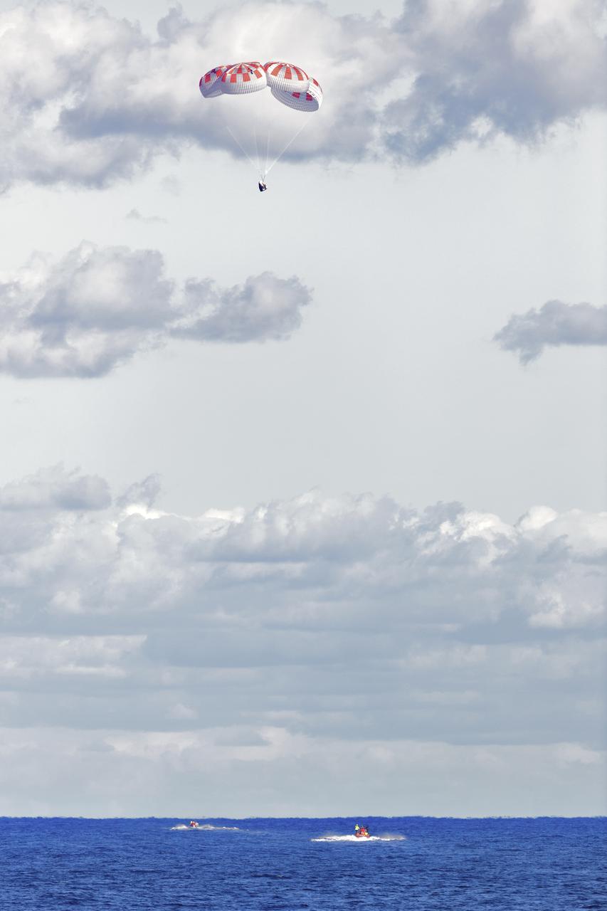 SpaceX’s Crew Dragon is guided by four parachutes toward the Atlantic Ocean on March 8, 2019, after returning from the International Space Station on the Demo-1 mission. The uncrewed spacecraft docked to the orbiting laboratory on March 3, following a 2:49 a.m. EST liftoff aboard a SpaceX Falcon 9 rocket from Launch Complex 39A at NASA’s Kennedy Space Center in Florida on March 2. Crew Dragon made 18 orbits of Earth before successfully attaching to the space station. The spacecraft undocked at 2:32 a.m., March 8, splashing down in the Atlantic Ocean, about 200 miles off Florida’s east coast at 8:45 a.m. SpaceX’s inaugural flight with NASA’s Commercial Crew Program is the first flight test of a space system designed for humans built and operated by a commercial company through a public-private partnership. NASA and SpaceX will use data from Demo-1 to further prepare for Demo-2, the crewed flight test that will carry NASA astronauts Bob Behnken and Doug Hurley to the International Space Station later this year.