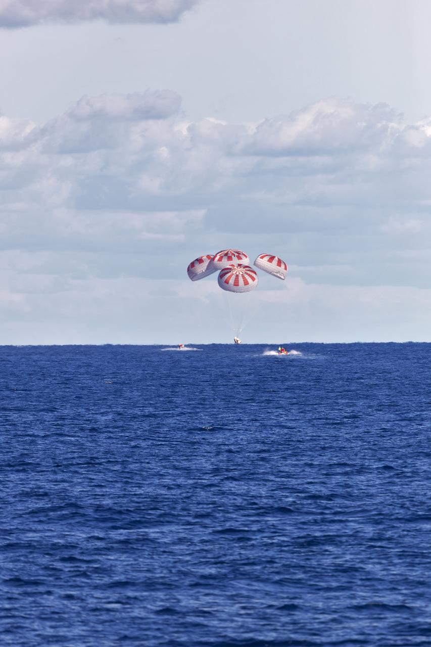 SpaceX’s Crew Dragon is guided by four parachutes as it splashes down in the Atlantic Ocean about 200 miles off Florida’s east coast on March 8, 2019, after returning from the International Space Station on the Demo-1 mission. The uncrewed spacecraft docked to the orbiting laboratory on March 3, following a 2:49 a.m. EST liftoff aboard a SpaceX Falcon 9 rocket from Launch Complex 39A at NASA’s Kennedy Space Center in Florida on March 2. Crew Dragon made 18 orbits of Earth before successfully attaching to the space station. The spacecraft undocked at 2:32 a.m., March 8, splashing down in the Atlantic Ocean at 8:45 a.m. SpaceX’s inaugural flight with NASA’s Commercial Crew Program is the first flight test of a space system designed for humans built and operated by a commercial company through a public-private partnership. NASA and SpaceX will use data from Demo-1 to further prepare for Demo-2, the crewed flight test that will carry NASA astronauts Bob Behnken and Doug Hurley to the International Space Station later this year.