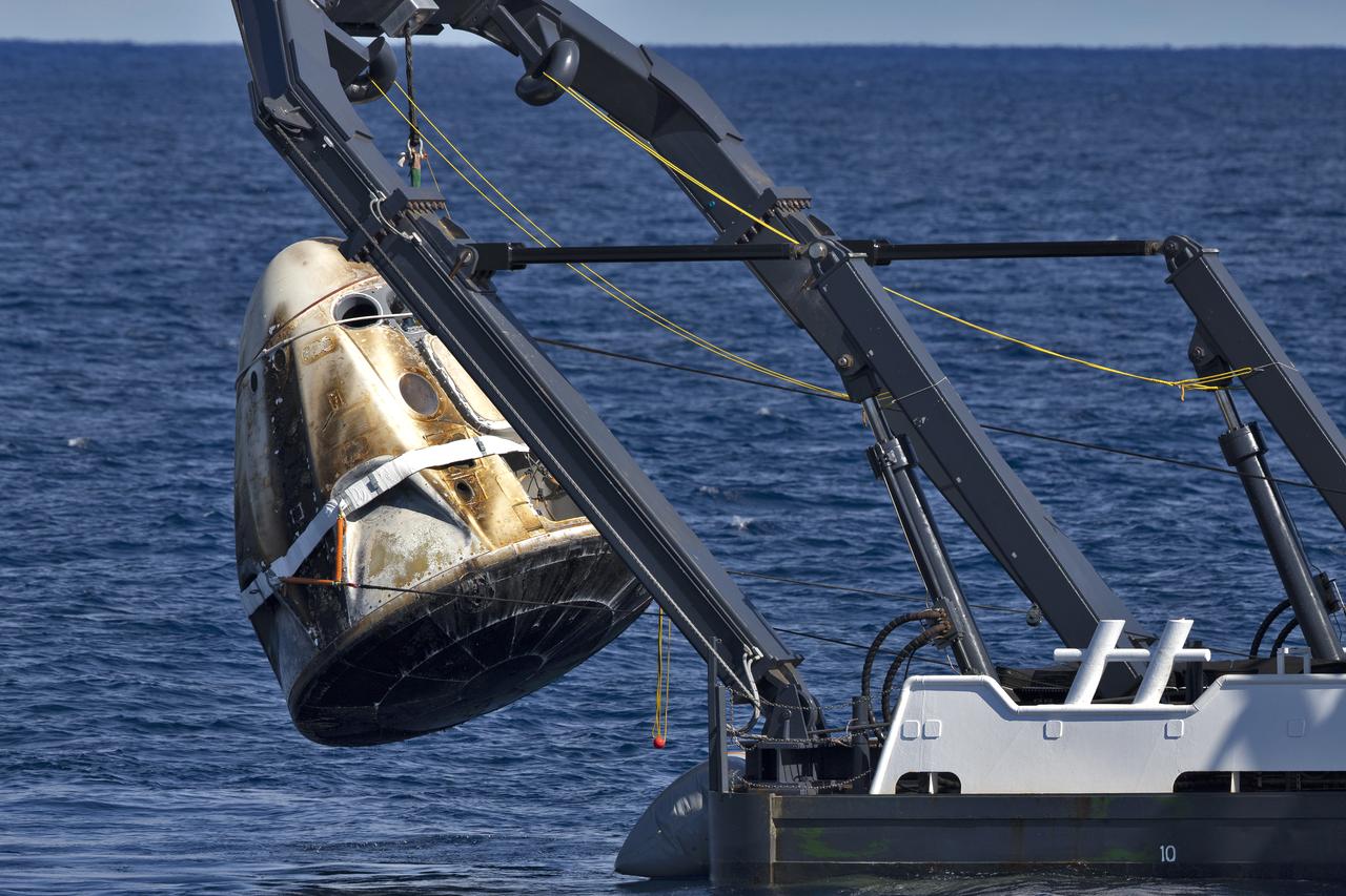 SpaceX’s Crew Dragon is retrieved by the company’s recovery ship, Go Searcher, in the Atlantic Ocean, about 200 miles off the east coast of Florida March 8, 2019, after its return to Earth on the Demo-1 mission. The uncrewed spacecraft docked to the orbiting laboratory on March 3, following a 2:49 a.m. EST liftoff aboard a SpaceX Falcon 9 rocket from Launch Complex 39A at NASA’s Kennedy Space Center in Florida on March 2. The spacecraft undocked at 2:32 a.m., March 8, splashing down in the Atlantic Ocean, at 8:45 a.m. SpaceX’s inaugural flight with NASA’s Commercial Crew Program is the first flight test of a space system designed for humans built and operated by a commercial company through a public-private partnership. NASA and SpaceX will use data from Demo-1 to further prepare for Demo-2, the crewed flight test that will carry NASA astronauts Bob Behnken and Doug Hurley to the International Space Station later this year.