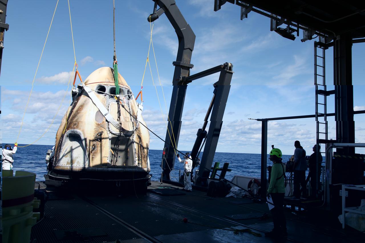 SpaceX’s Crew Dragon is loaded onto the company’s recovery ship, Go Searcher, in the Atlantic Ocean, about 200 miles off Florida’s east coast, on March 8, after returning from the International Space Station on the Demo-1 mission. The uncrewed spacecraft docked to the orbiting laboratory on March 3, following a 2:49 a.m. EST liftoff aboard a SpaceX Falcon 9 rocket from Launch Complex 39A at NASA’s Kennedy Space Center in Florida on March 2. The spacecraft undocked at 2:32 a.m., March 8, splashing down in the Atlantic Ocean, at 8:45 a.m. SpaceX’s inaugural flight with NASA’s Commercial Crew Program is the first flight test of a space system designed for humans built and operated by a commercial company through a public-private partnership. NASA and SpaceX will use data from Demo-1 to further prepare for Demo-2, the crewed flight test that will carry NASA astronauts Bob Behnken and Doug Hurley to the International Space Station later this year.