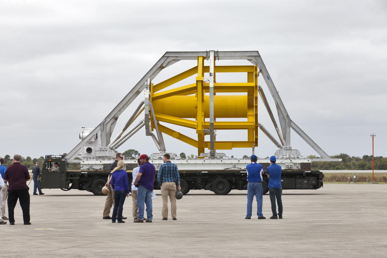 A fit check of the Orion Crew and Service Module Horizontal Transporter (CHT) with NASA's Super Guppy aircraft began March 12, 2019, at NASA Kennedy Space Center’s Shuttle Landing Facility in Florida, operated by Space Florida. In this photo, the CHT is secured on the U.S. Air Force aircraft loader. The fit check is being performed to confirm loading operations, ensure that the CHT fits inside the Super Guppy and test the electrical interface to aircraft power. The Orion crew and service modules will be readied for a trip to NASA’s Plum Brook Station in Sandusky, Ohio, for full thermal vacuum testing. In this unique facility, the crew and service modules will be put through extensive testing to ensure they can survive the rigors of launch, space travel, re-entry and splashdown. The Orion spacecraft will launch atop the agency's Space Launch System rocket on Exploration Mission-1. 