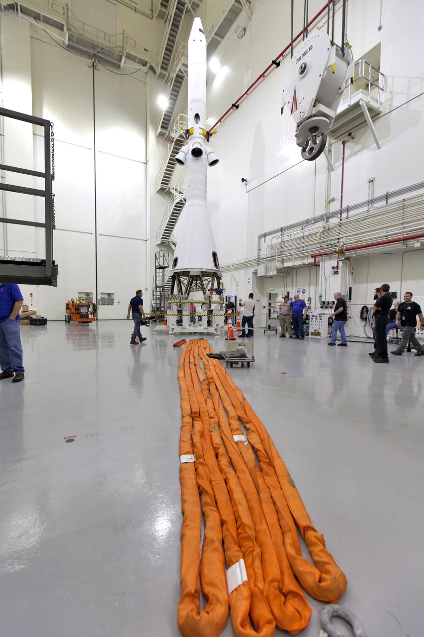 Inside the Launch Abort System Facility (LASF) at NASA’s Kennedy Space Center in Florida, workers are preparing to integrate a test version of the Orion crew module with the Launch Abort System (LAS) on March 13, 2019. The test vehicle and the LAS will be used for the Orion Ascent Abort-2 (AA-2) Flight Test. AA-2 is a full-stress test of the LAS, scheduled for spring 2019. AA-2 will launch from Space Launch Complex 46, carrying a fully functional LAS and a 22,000-pound Orion test vehicle to an altitude of 31,000 feet and traveling at more than 1,000 miles an hour. The test will verify the LAS can steer the crew module and astronauts aboard to safety in the event of an issue with the Space Launch System (SLS) rocket when the spacecraft is under the highest aerodynamic loads it will experience during a rapid climb into space. NASA's Orion and Exploration Ground Systems programs and contractors from Jacob's and Northrop Grumman in conjunction with the Air Force Space and Missile Center's Launch Operations branch are performing flight operations for AA-2.